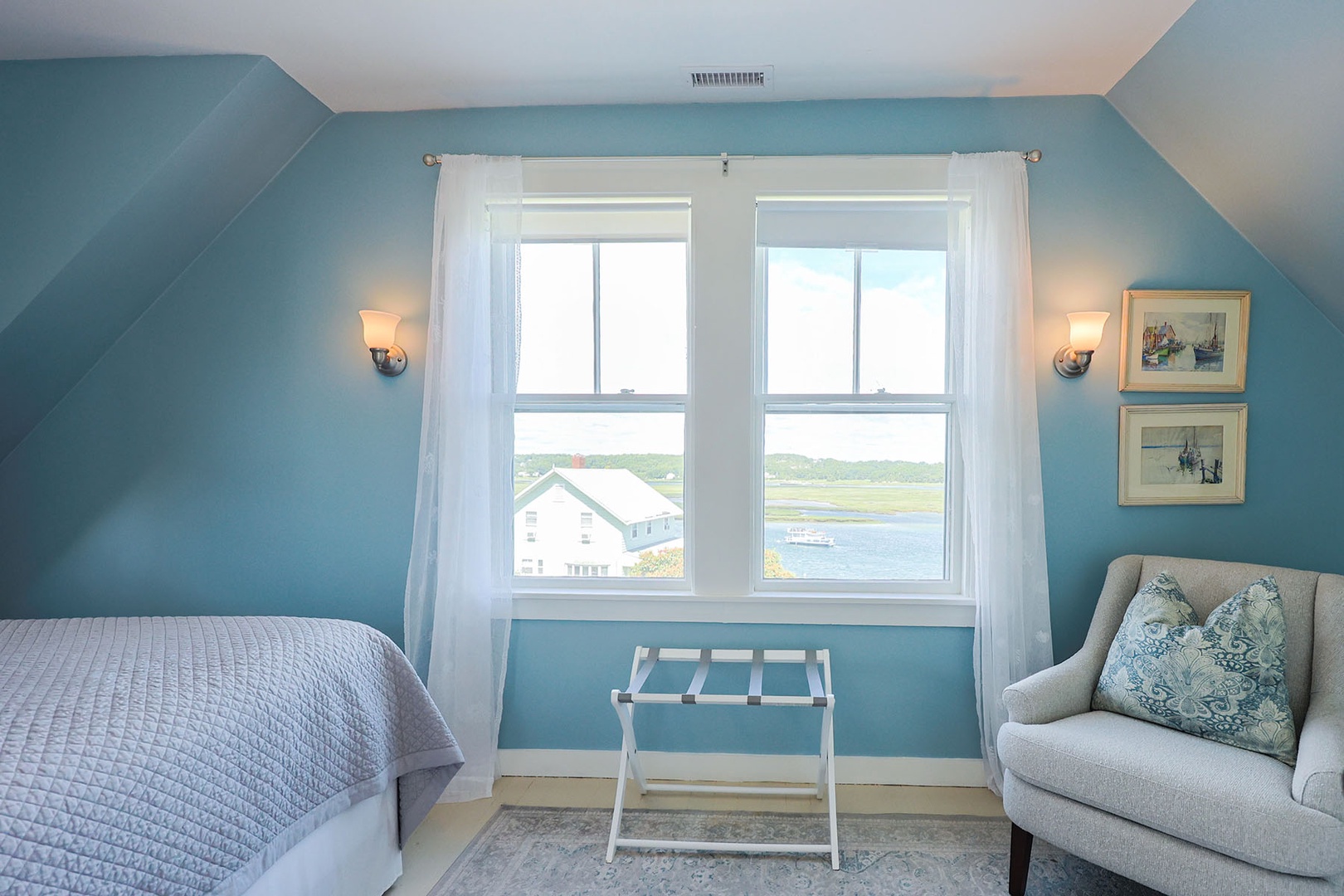 Primary Bedroom: includes a King bed and has river views.