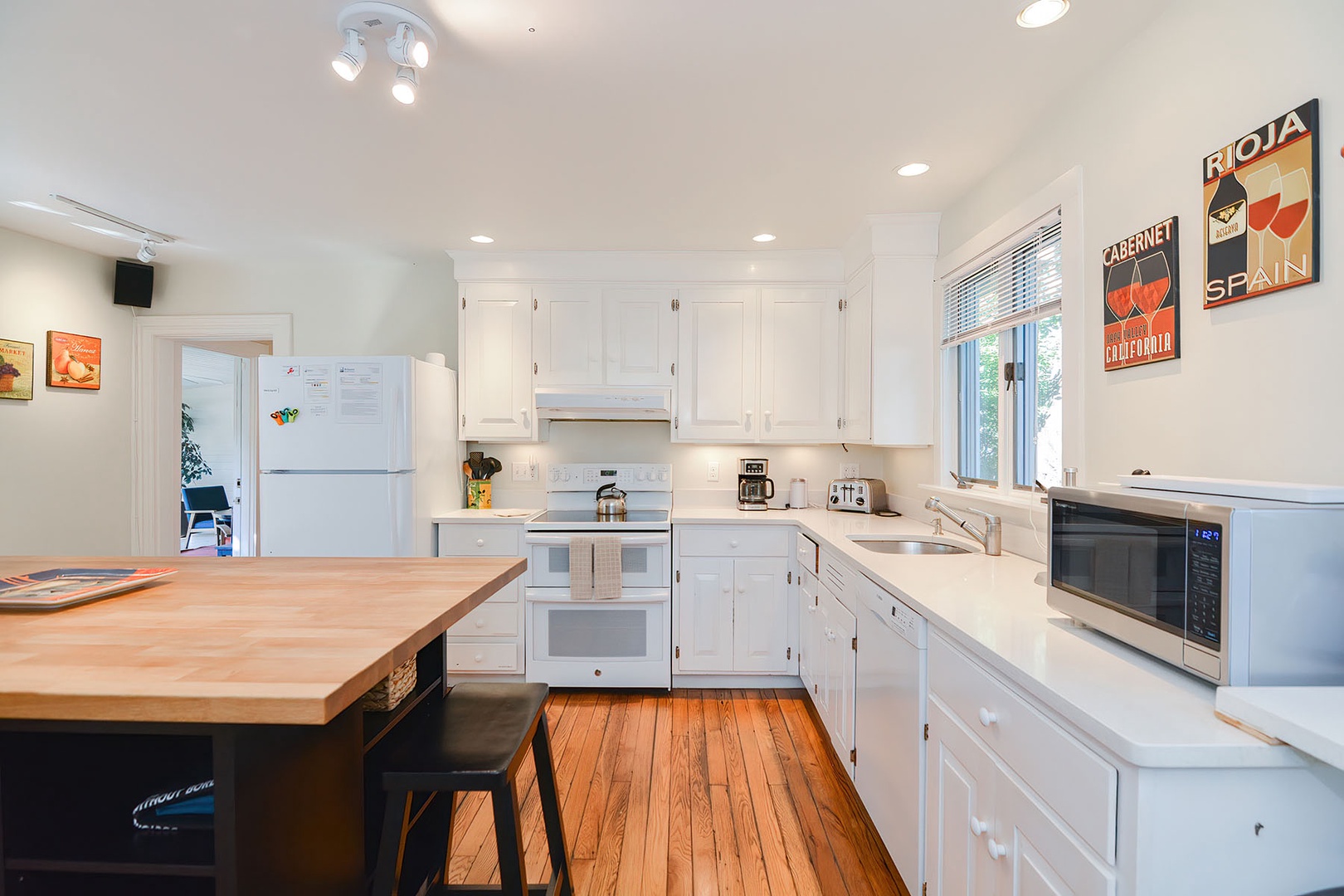 Enjoy your morning coffee and breakfast sitting at the large central island.
