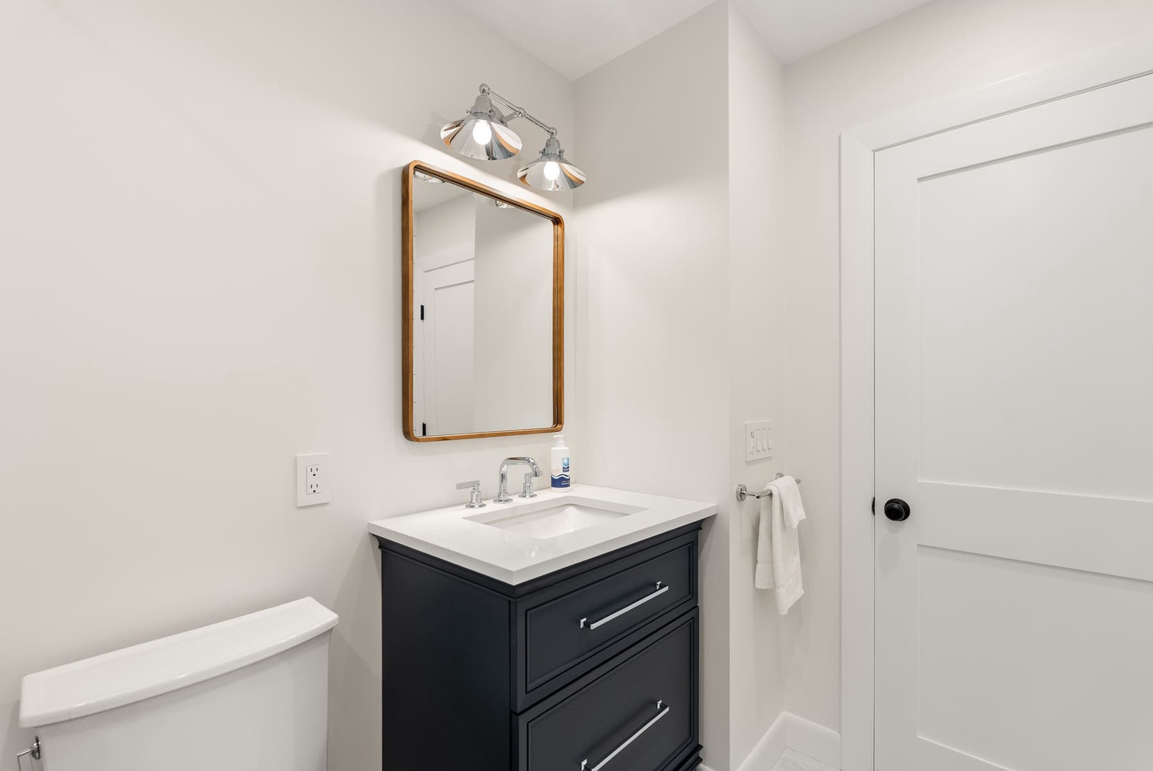 Full hall bathroom with a walk-in shower