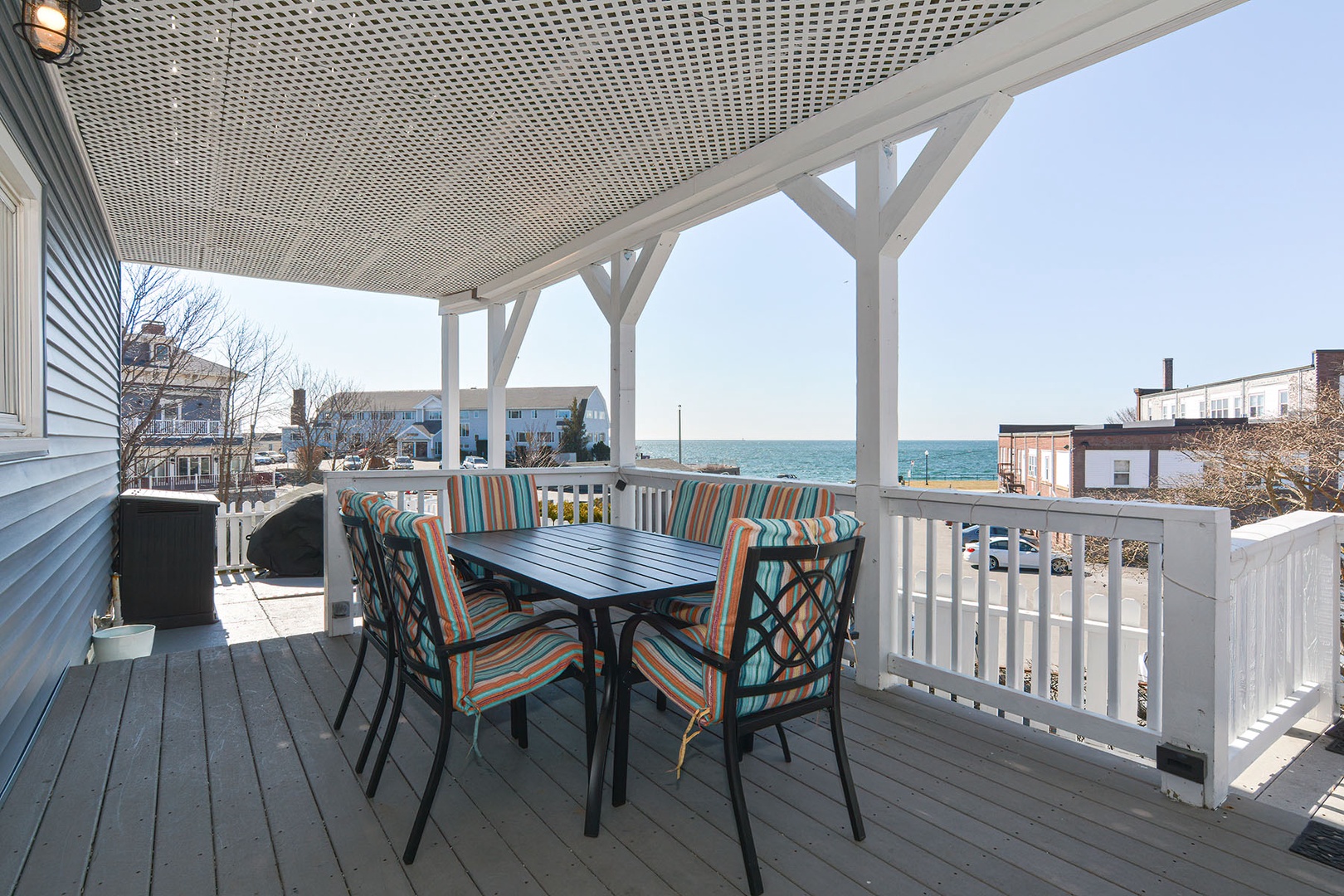 Outdoor dining with a water view.