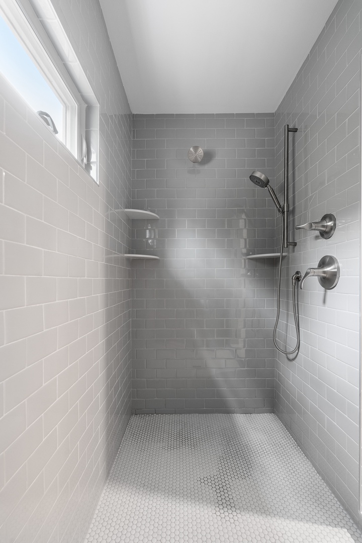 The primary full-bathroom with walk-in shower.
