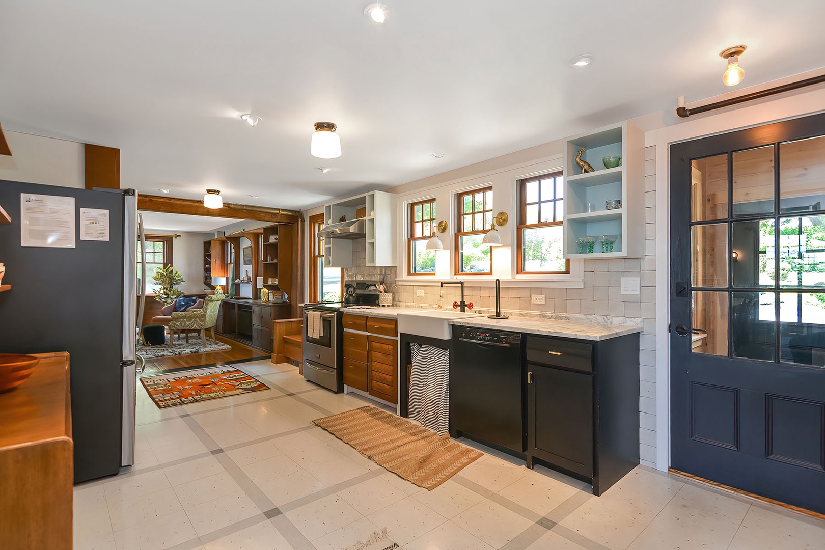 The remodeled kitchen is open to the living room.