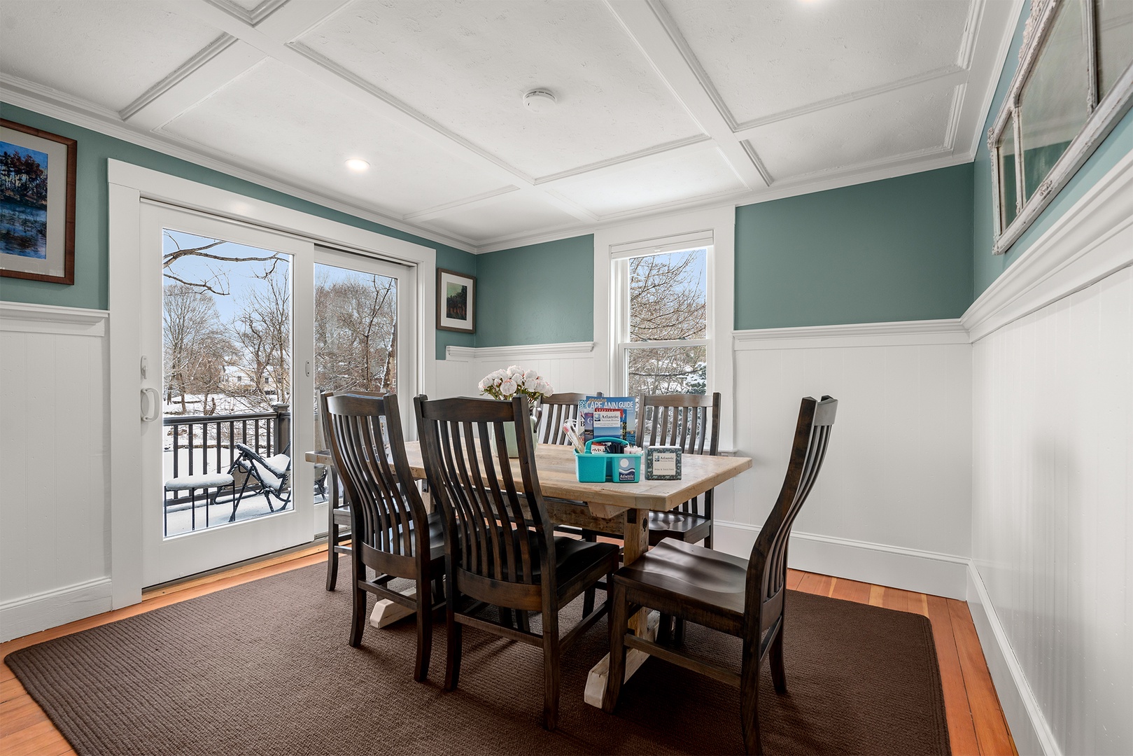 The dining area is located just off the kitchen with views outside.