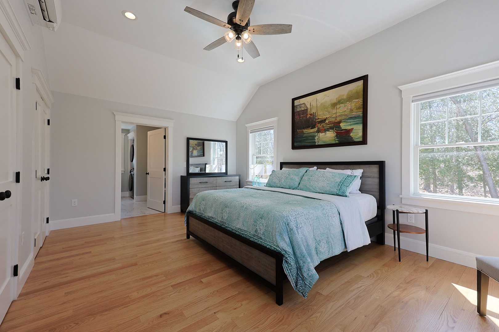 Comfortable and elegant primary bedroom.