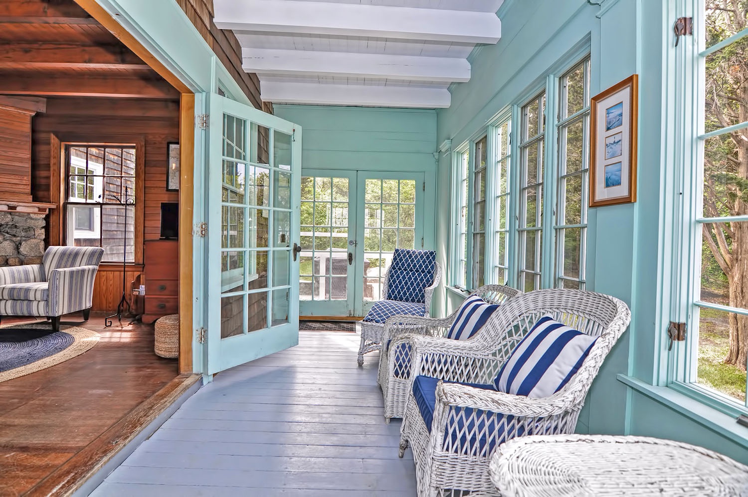 The sun porch is perfect to unwind, relax, or read a book.