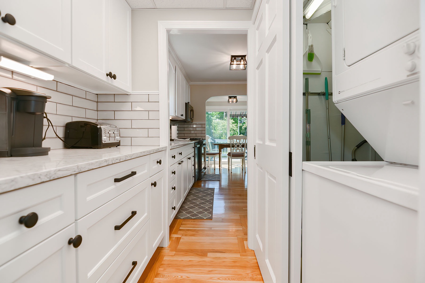 Washer and Dryer are located near the kitchen.