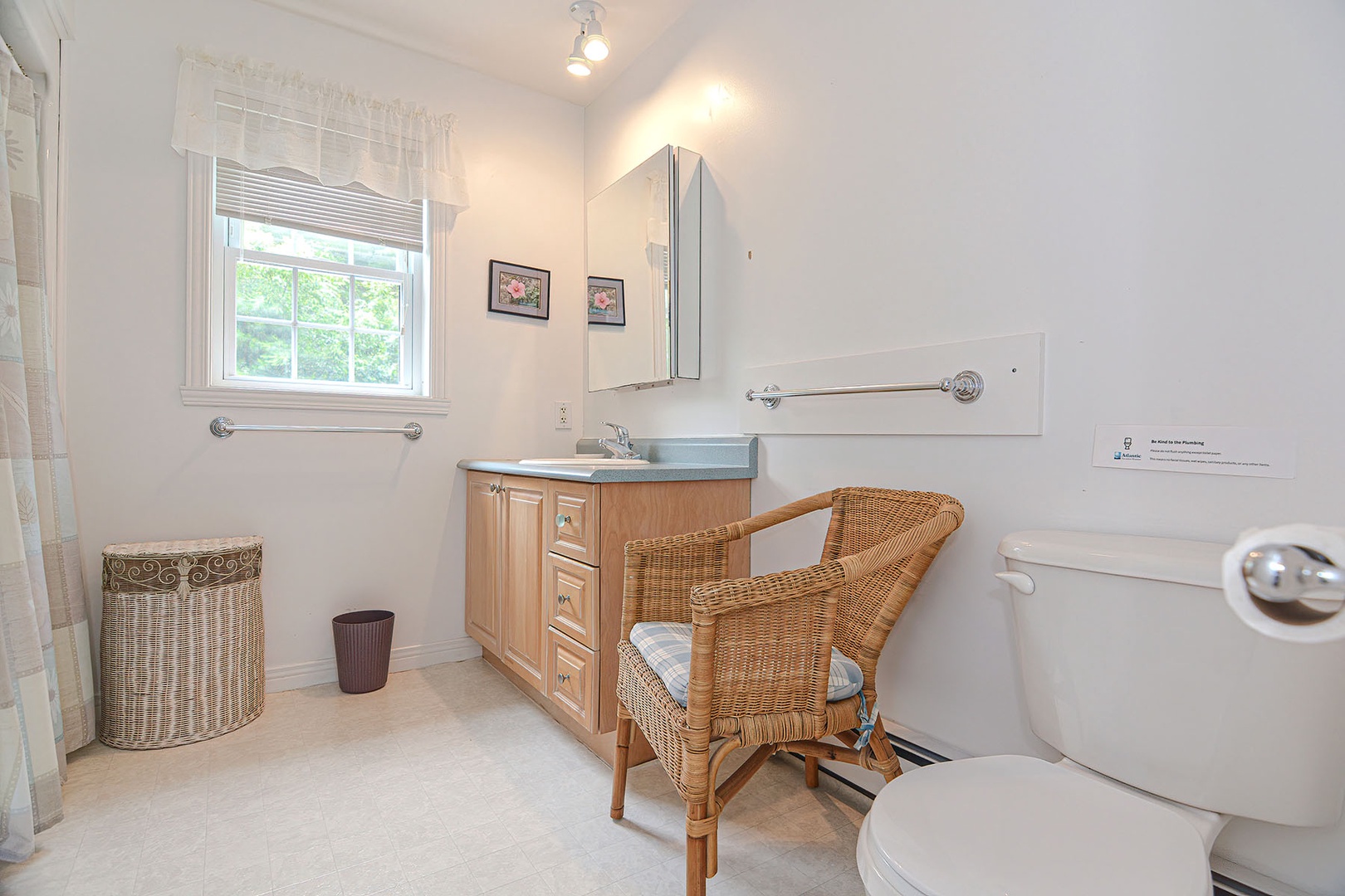 Full bathroom with walk in shower.