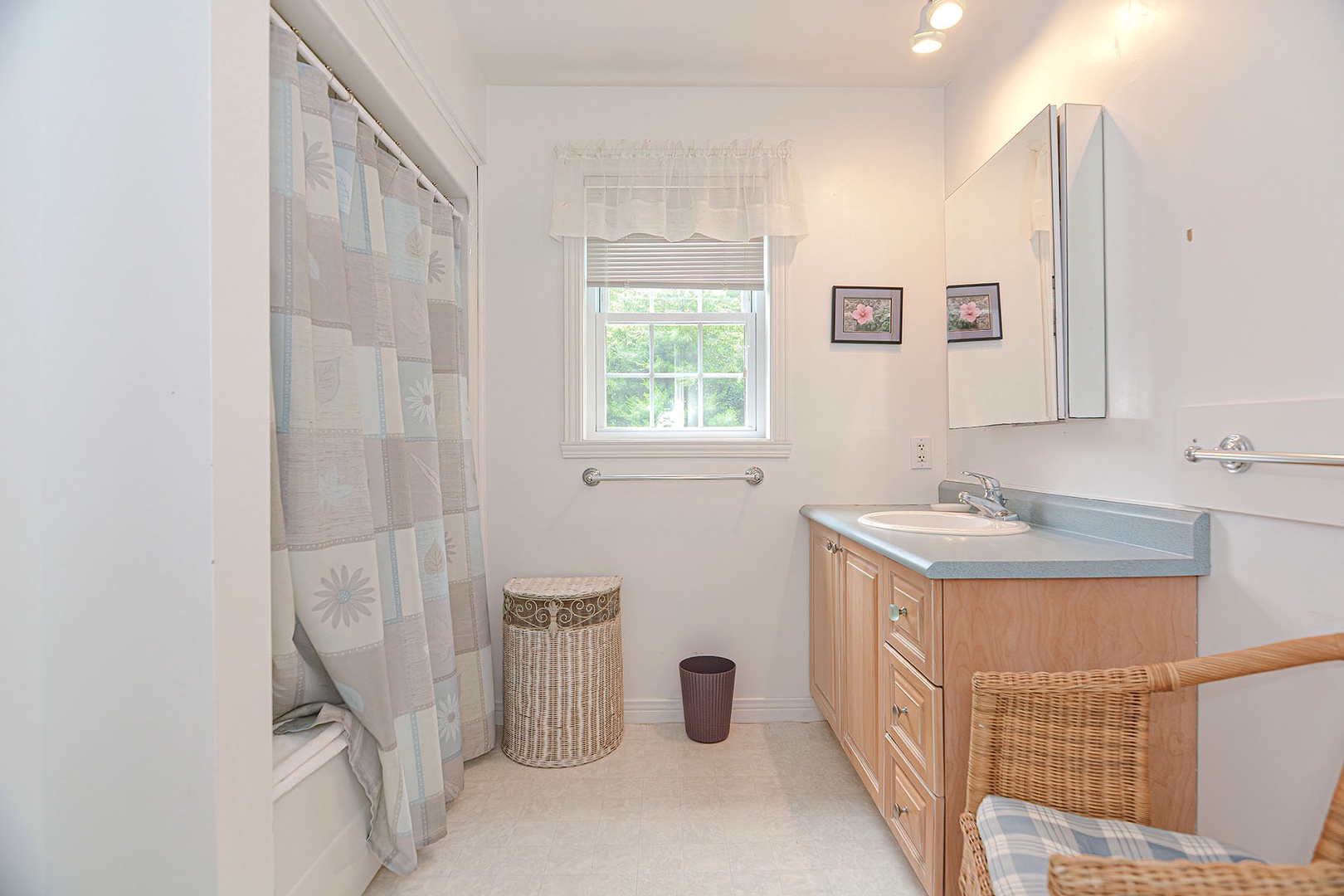 Full bathroom with walk in shower.