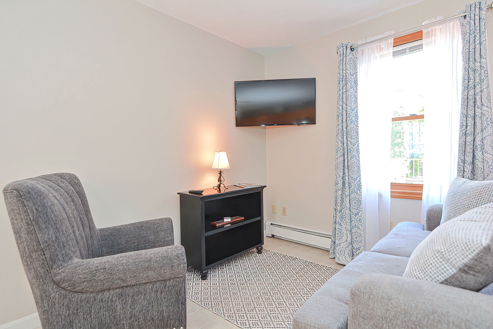 Wall-mounted tv for catching up on movies or shows.