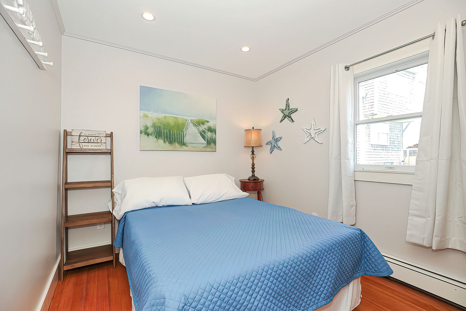 Bedroom 3: Full bed, on the main level.