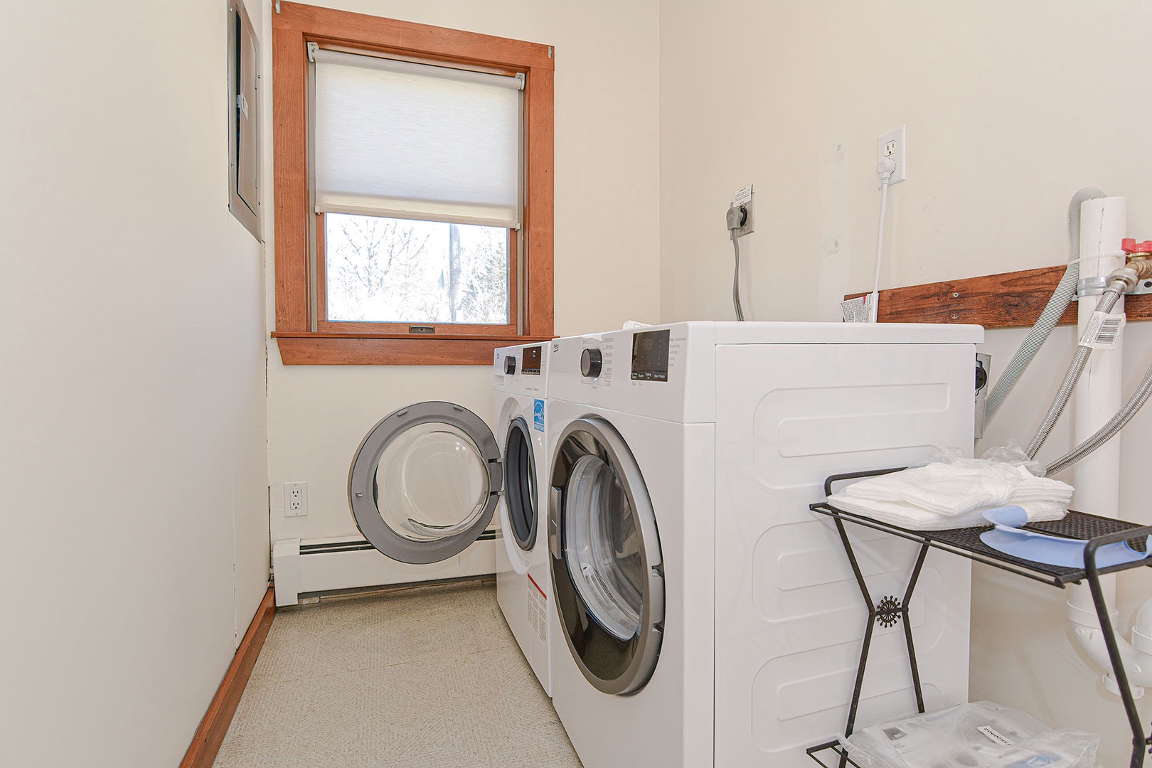 The laundry is located in the downstairs half bath.