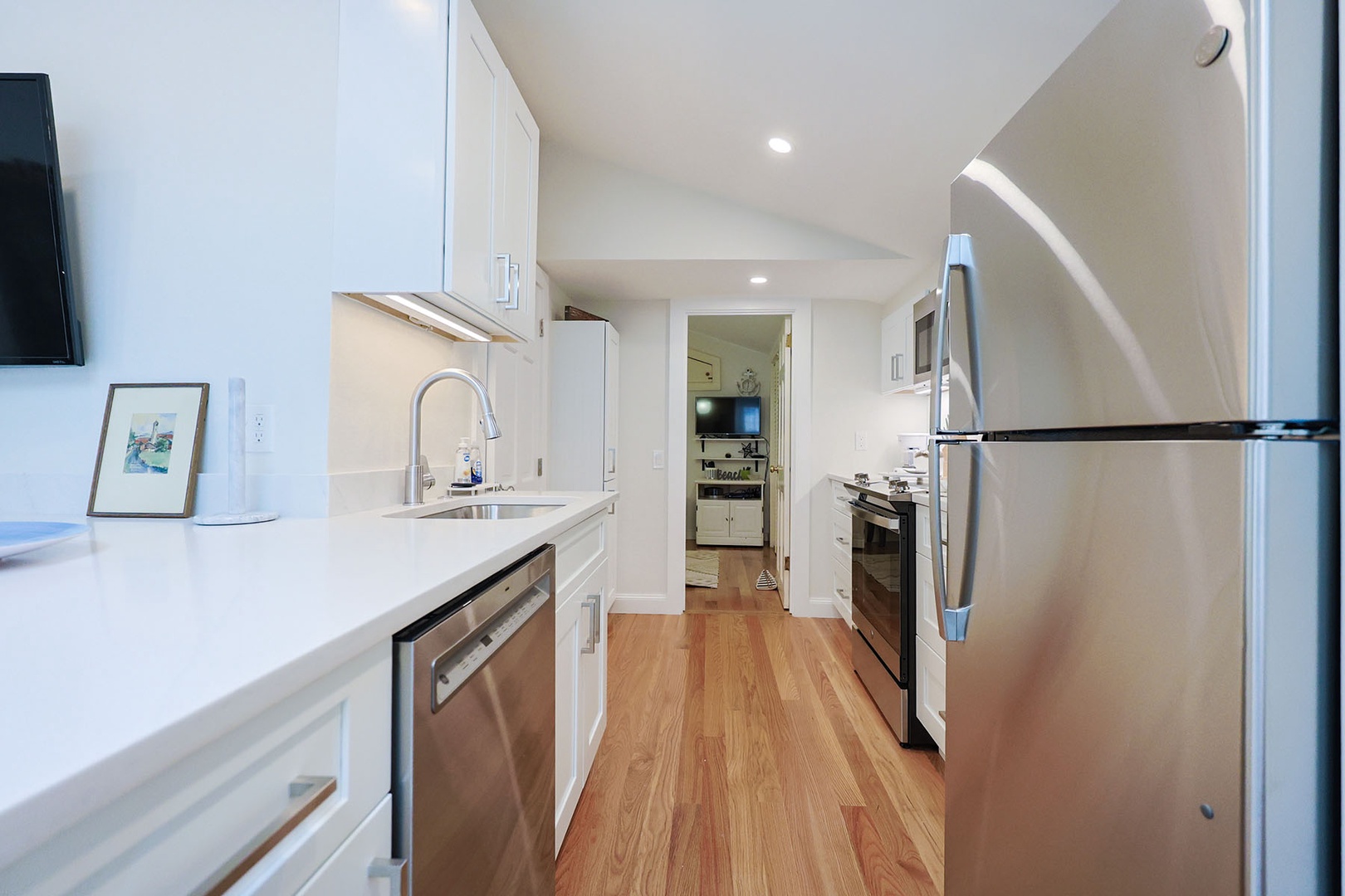 The kitchen is spacious with ample storage.