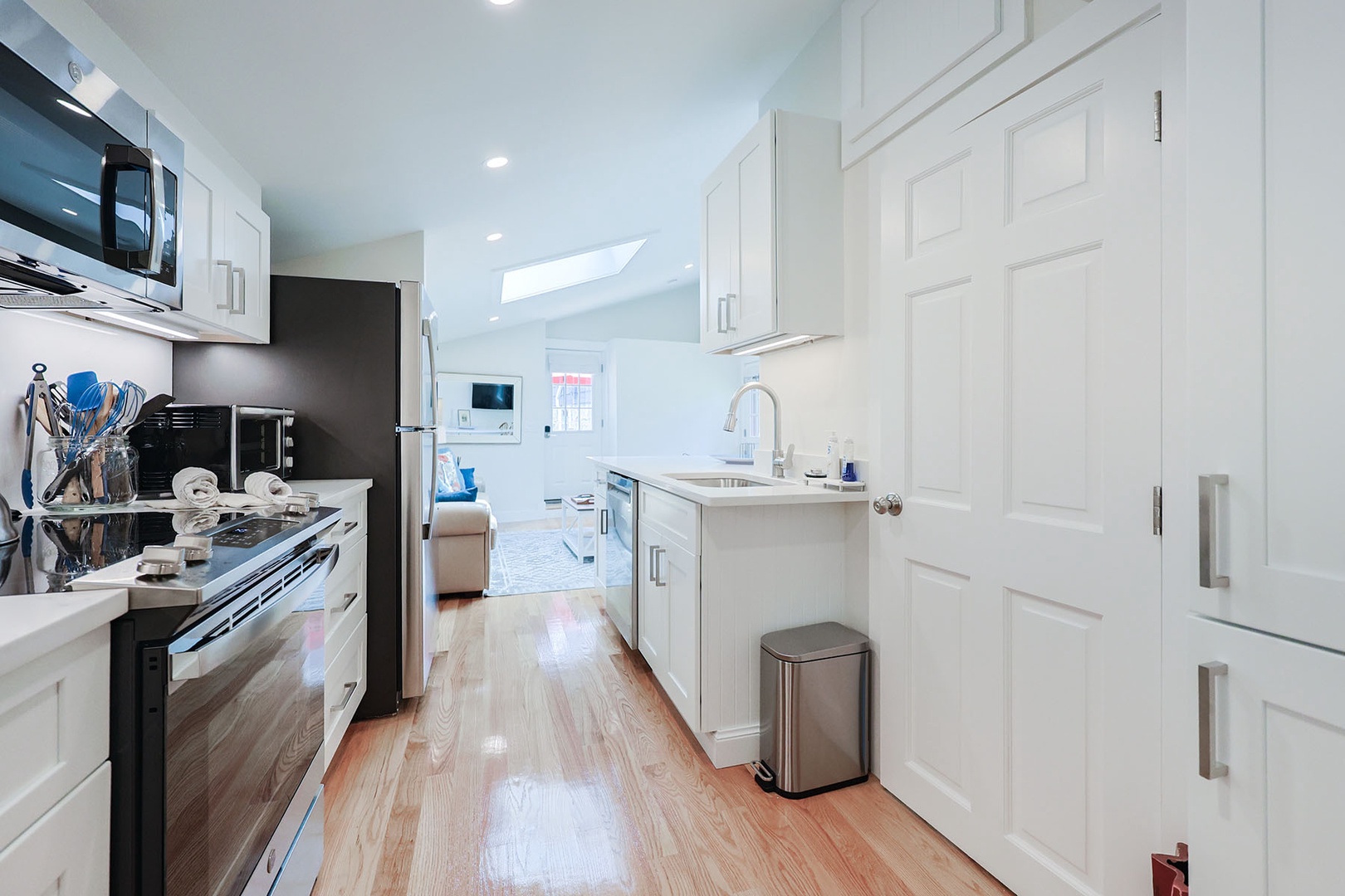 The kitchen is spacious with ample storage.