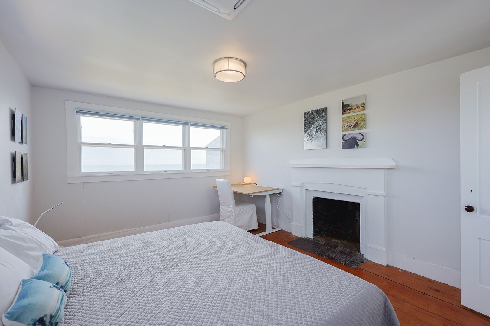 Bedroom 2 includes and ornamental fireplace.