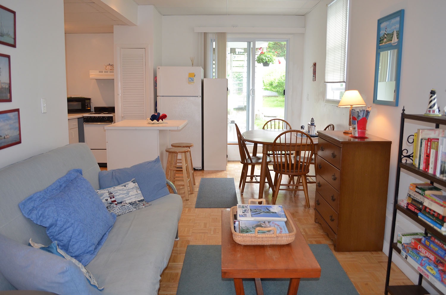 View of the living room toward open kitchen/dining area.