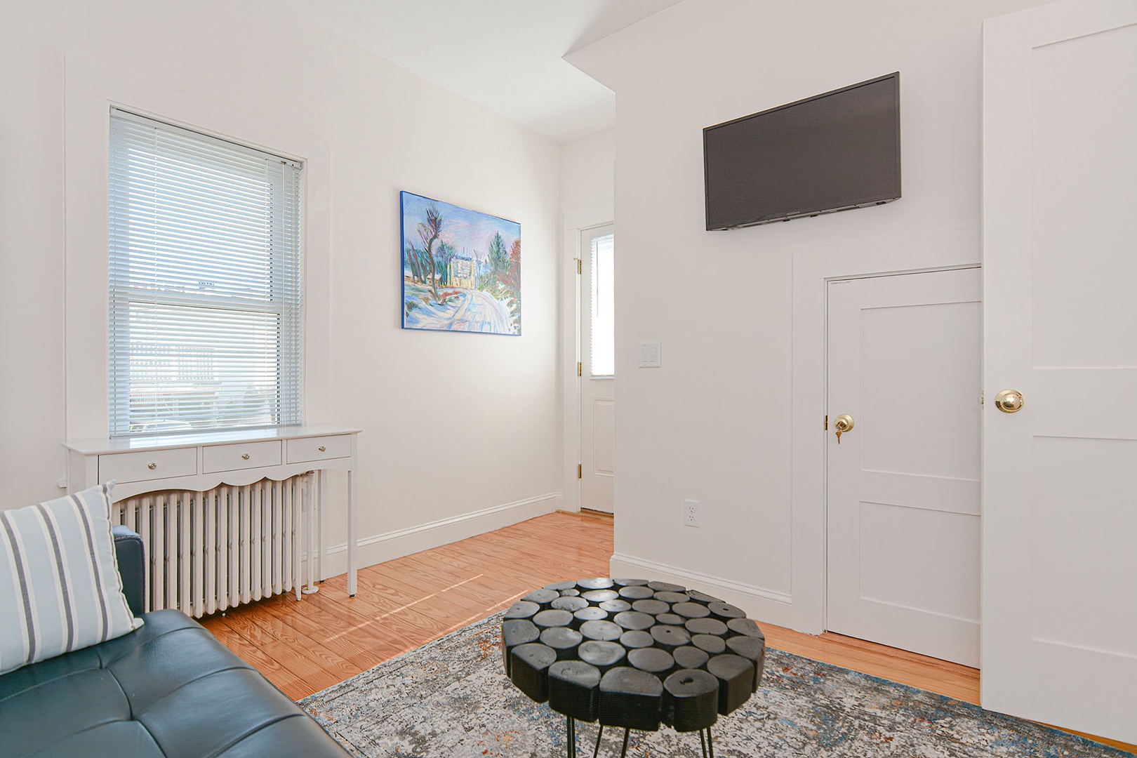 Access a side deck through the den.