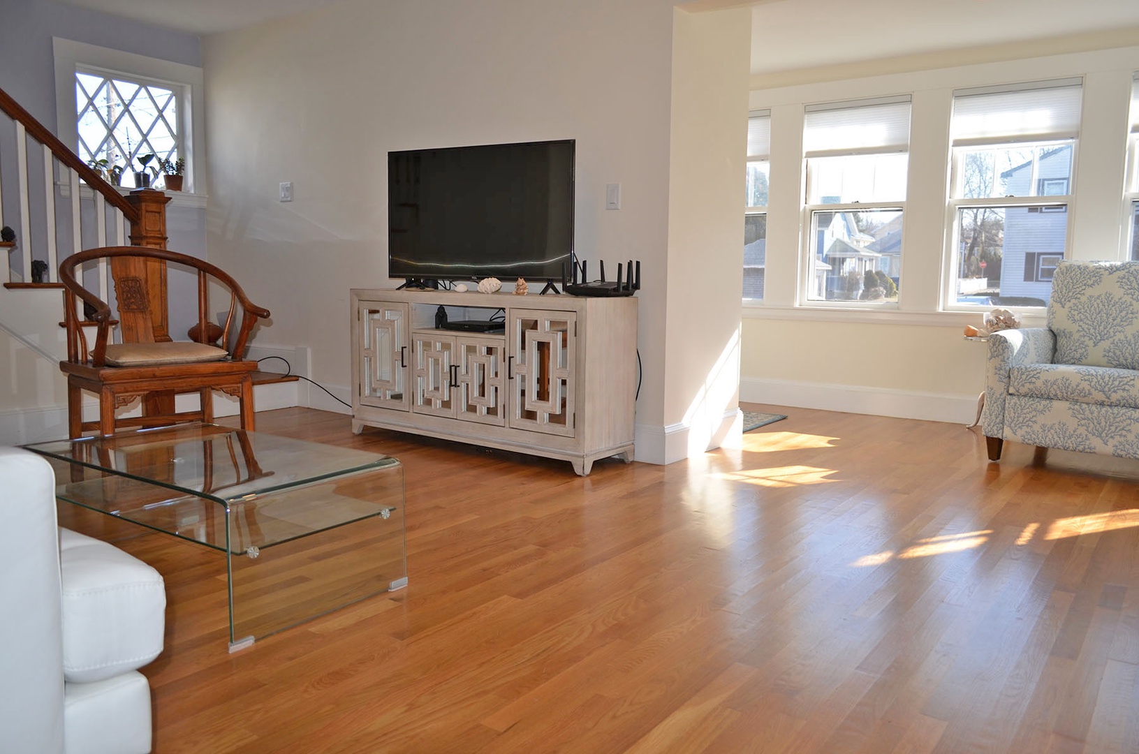 The living room has a large flatscreen TV.