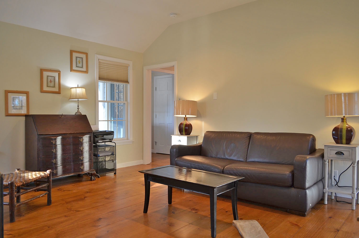 A sleeper sofa turns the den into a main-floor bedroom.