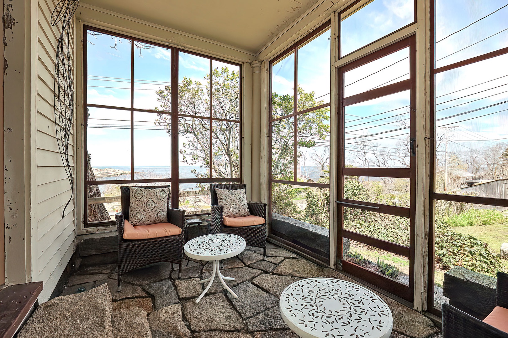 There is a screened porch with ocean views.