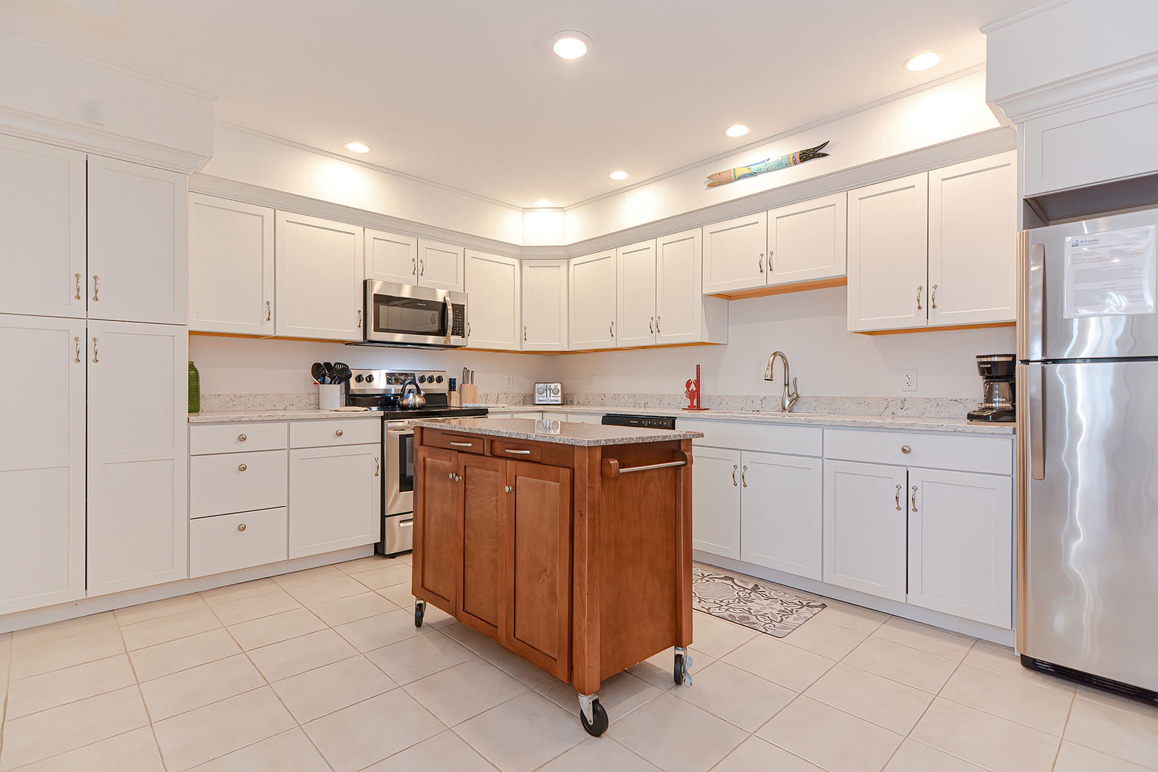 The kitchen has a movable island for extra prep space.