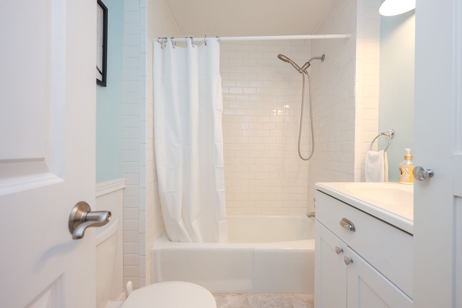 Bathroom 1: Full bath with tub/shower combo.
