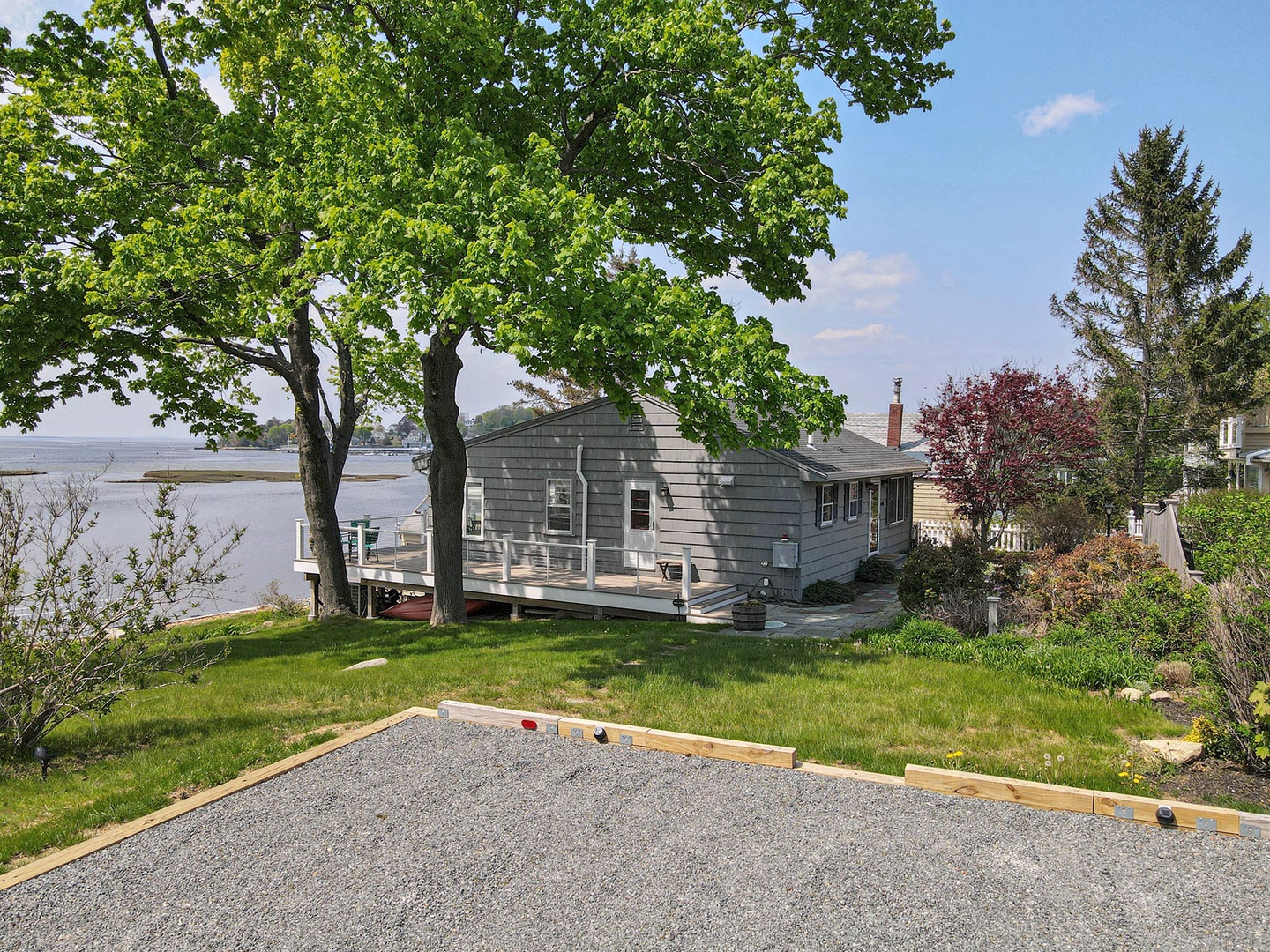 View of the house from the parking area. There are 2 parking spots.