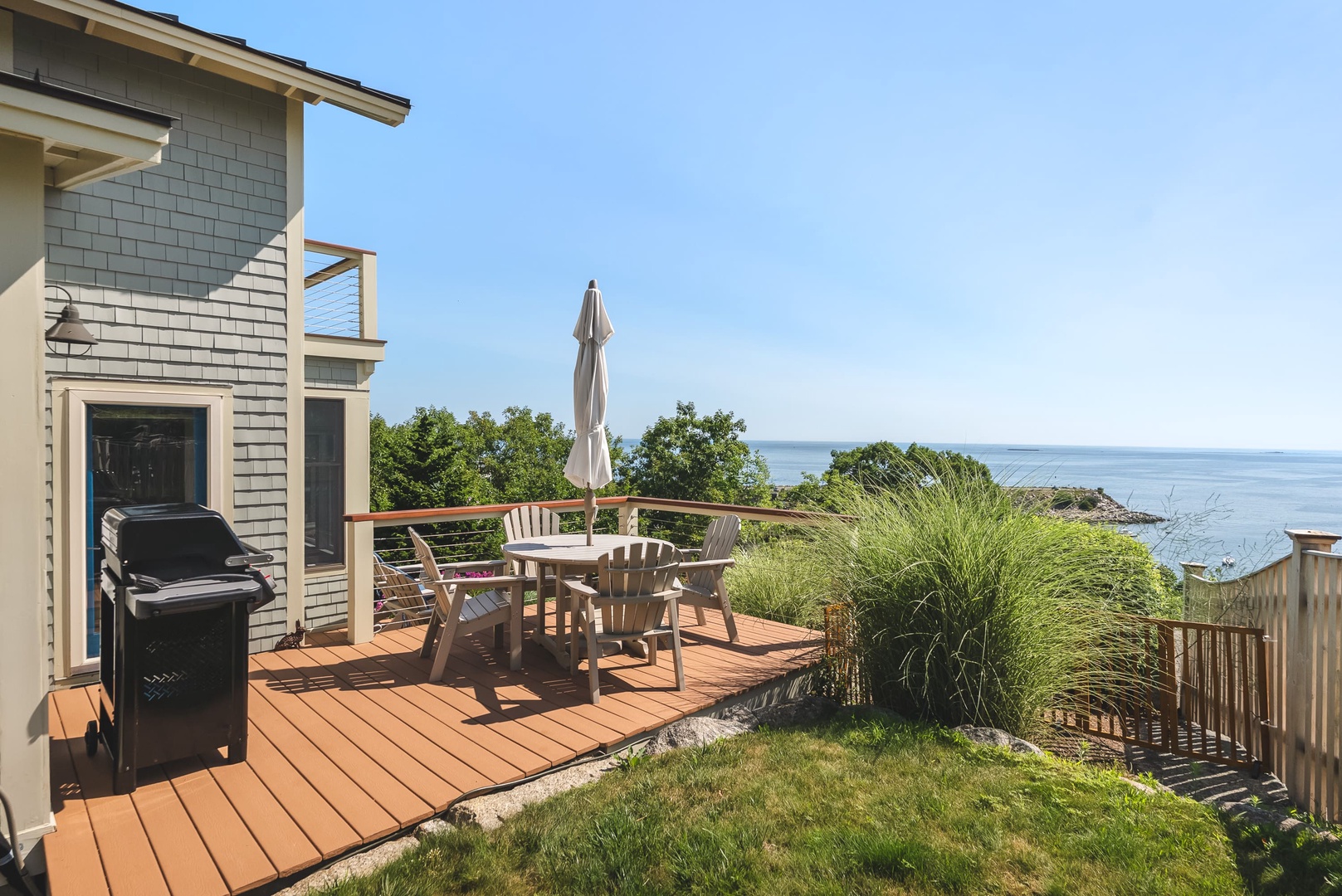 Bask in the views of Sandy Bay from your oceanfront deck.