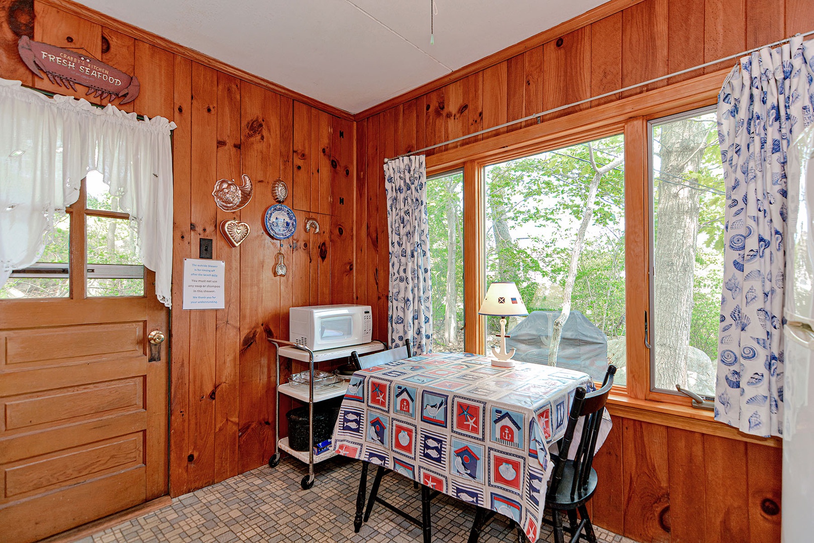The cozy cottage has an eat-in kitchen.