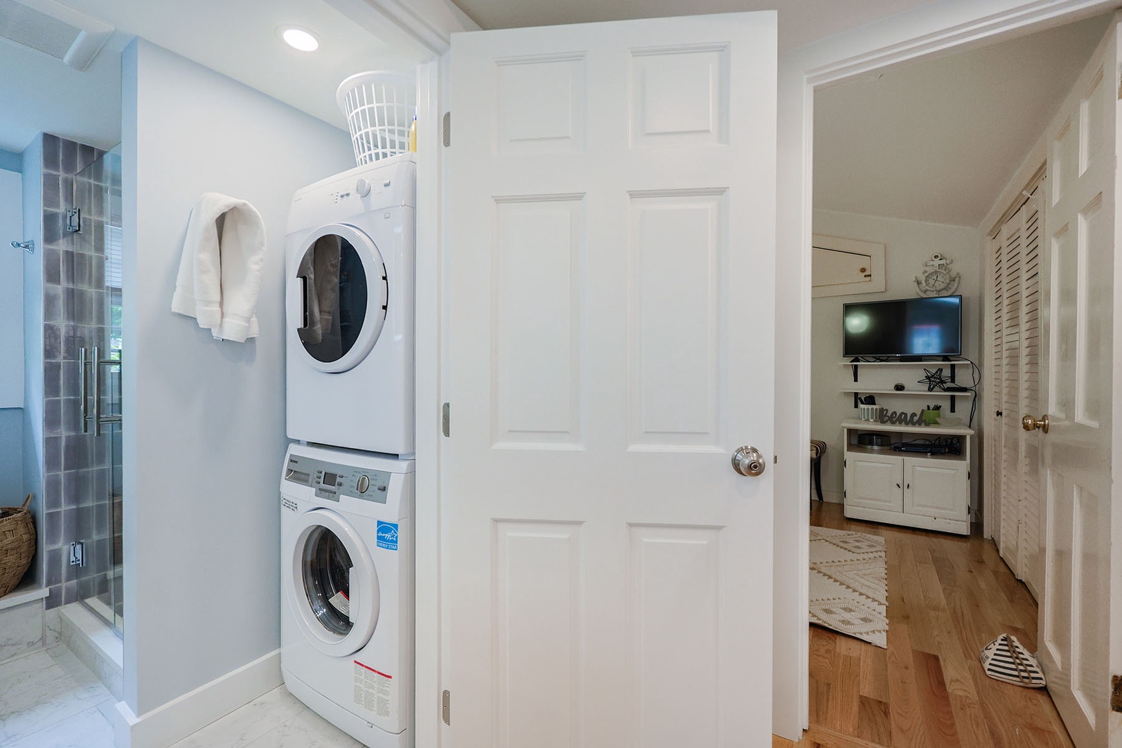 The washer and dryer area is located just off the kitchen.
