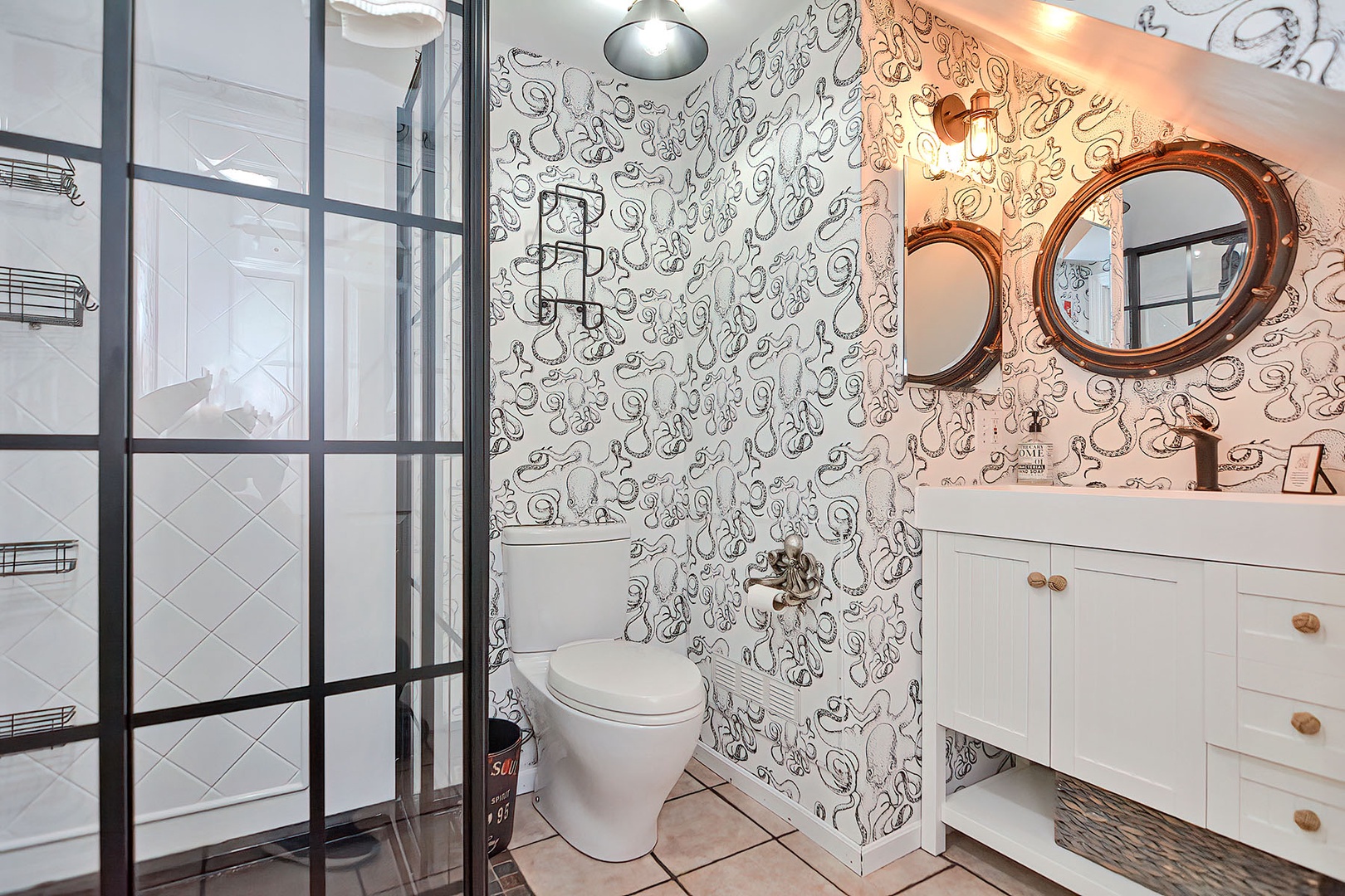 The full bath with glass walk-in shower.