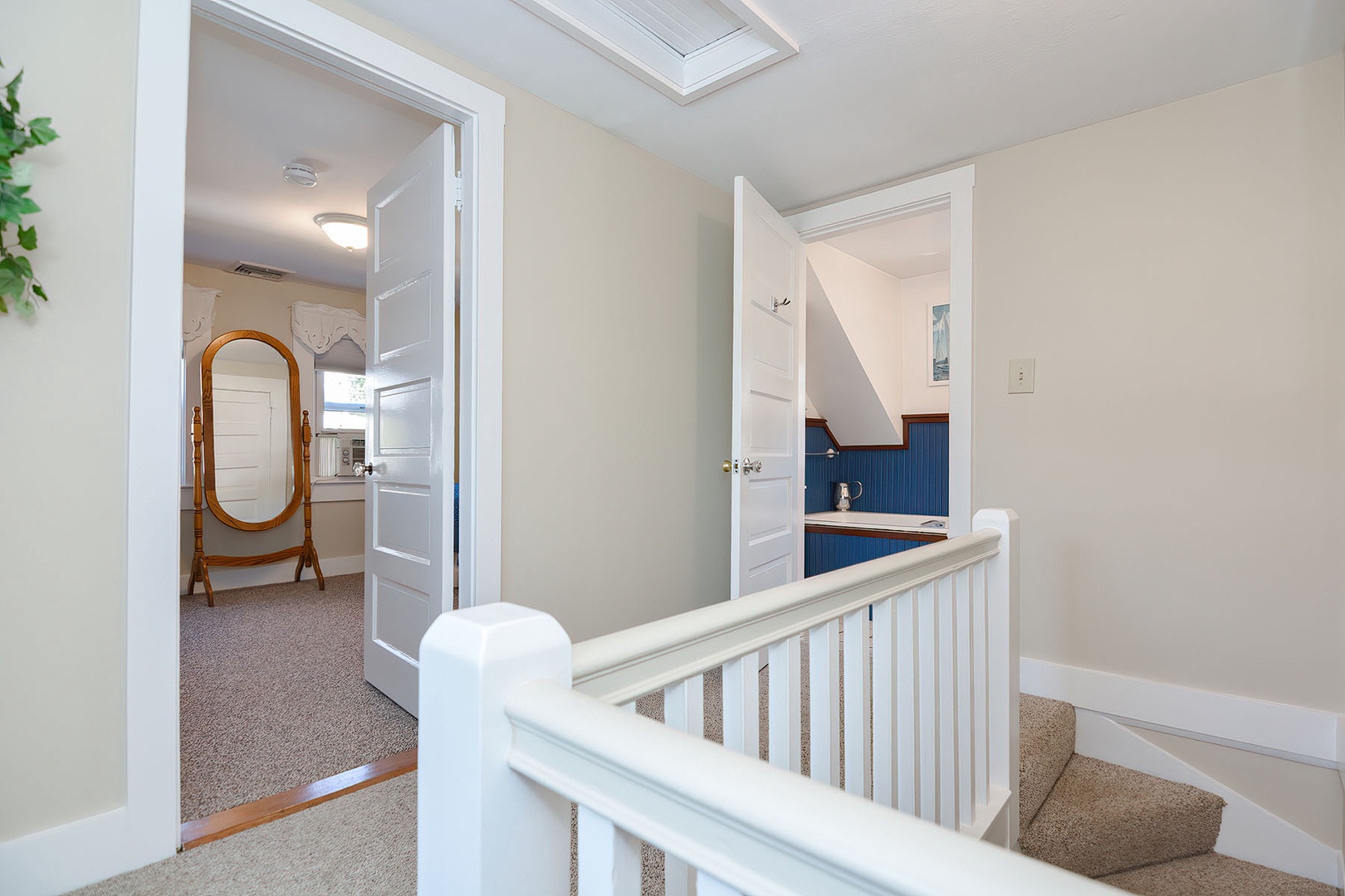 Second floor bathroom is located just by the stairs.