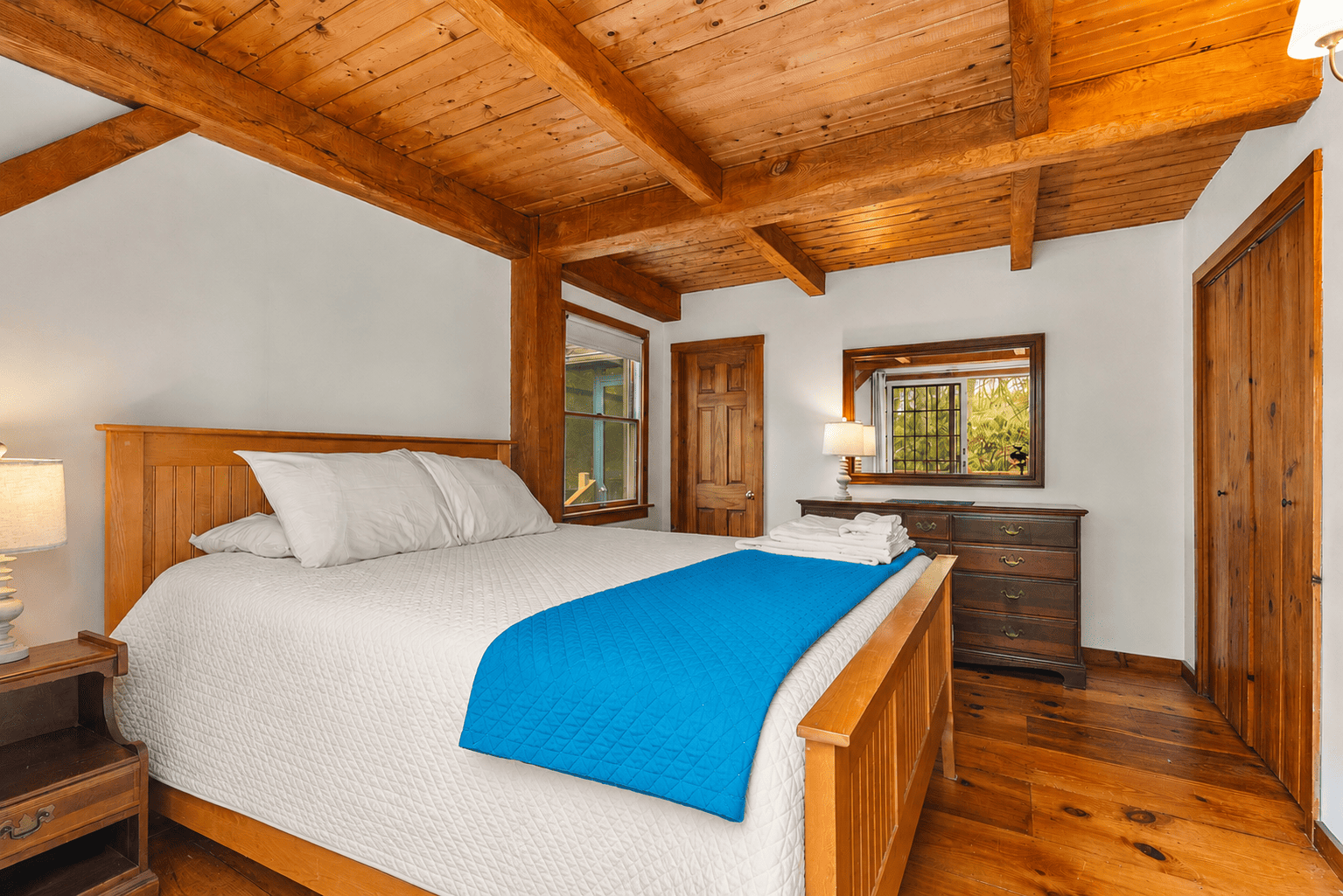 The primary bedroom with a queen bed.