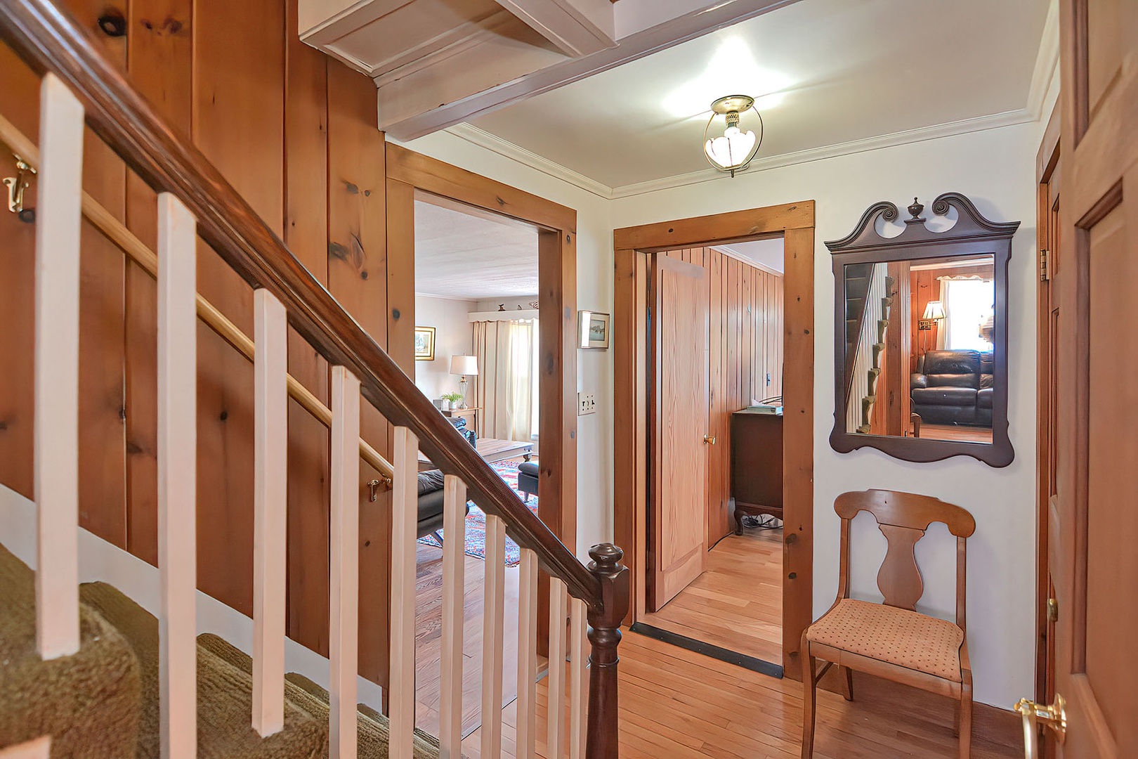 Hall view toward the living room and the ground floor bedroom.