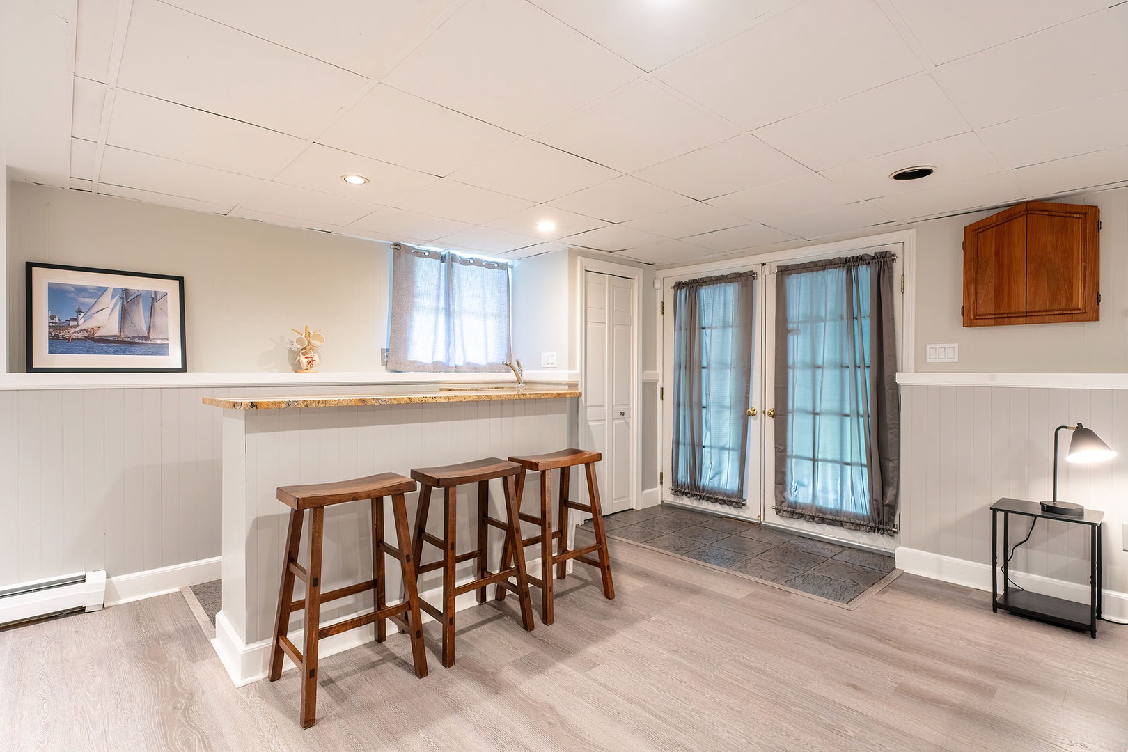 Bar with mini-fridge and patio doors