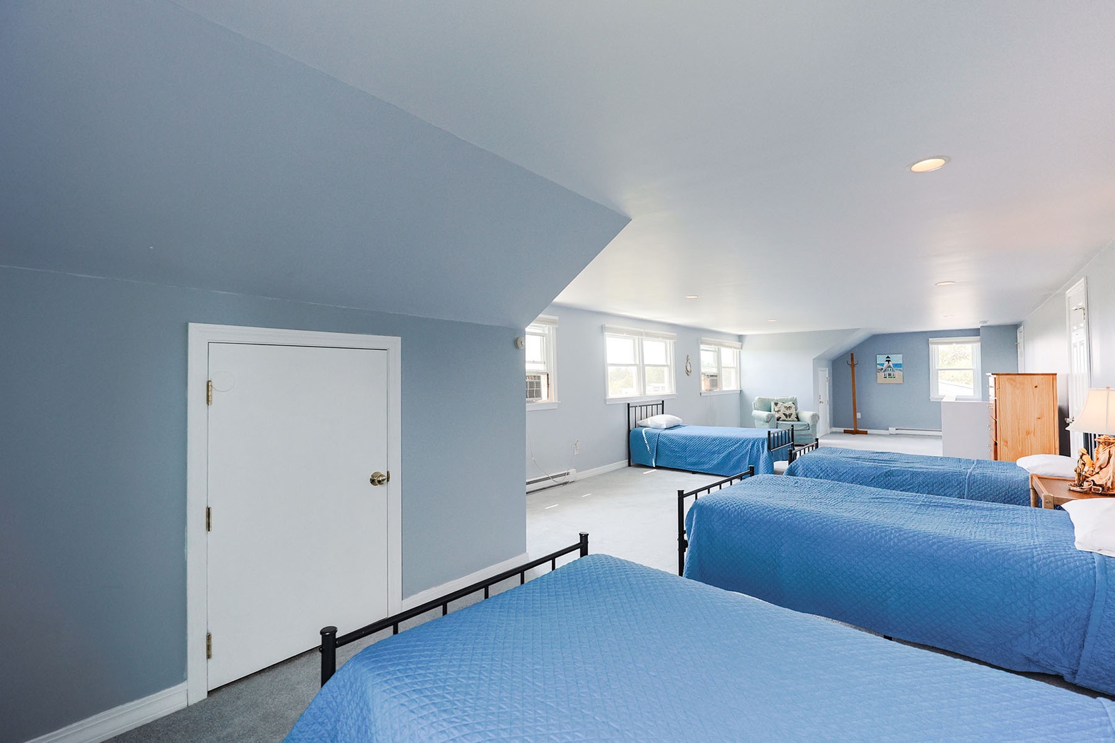 Bedroom 5: Twin beds and an ocean view.