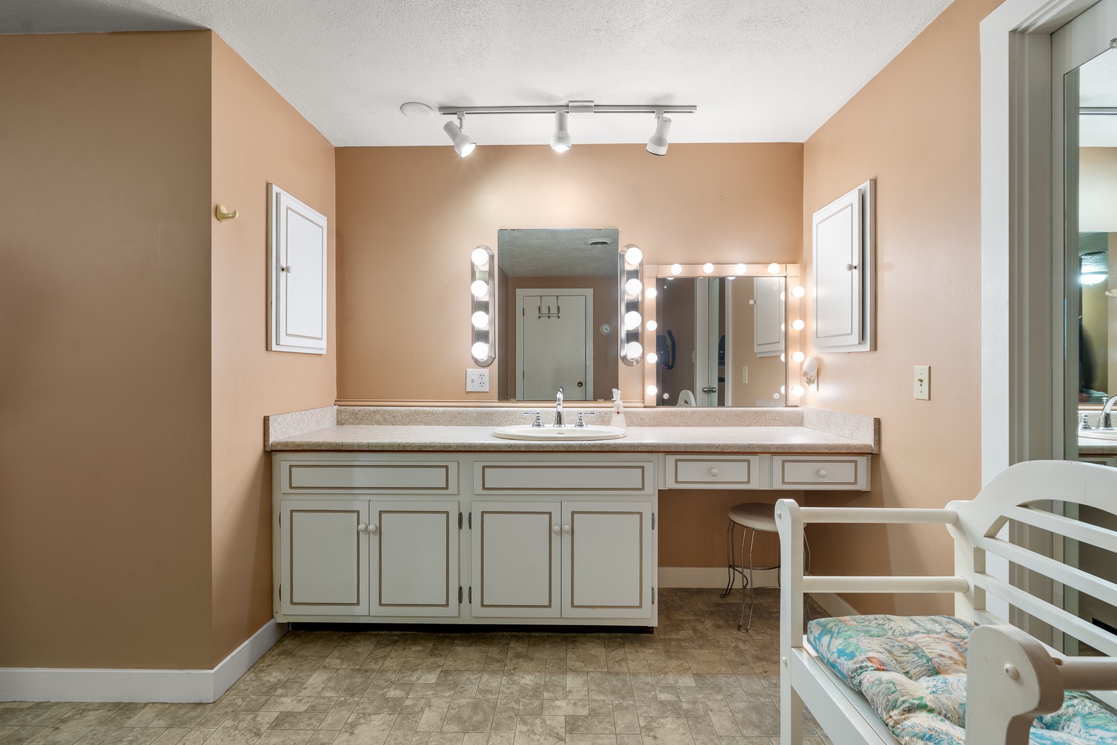 The full en-suite bathroom contains a powder room and a sauna.