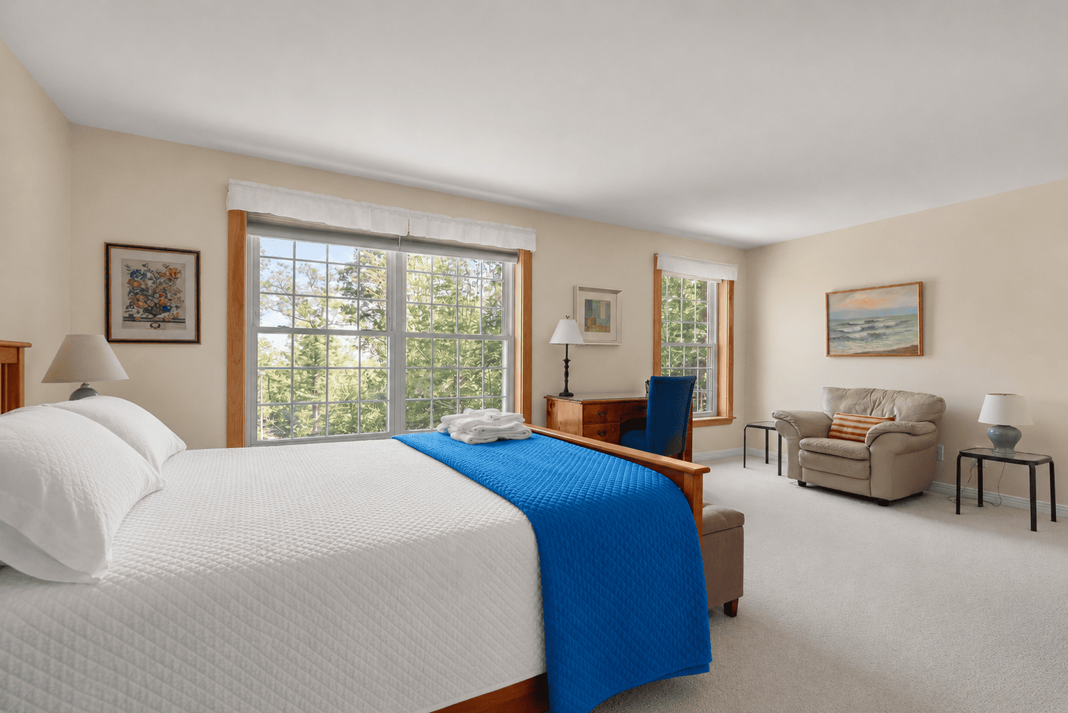 The primary bedroom with a queen bed.