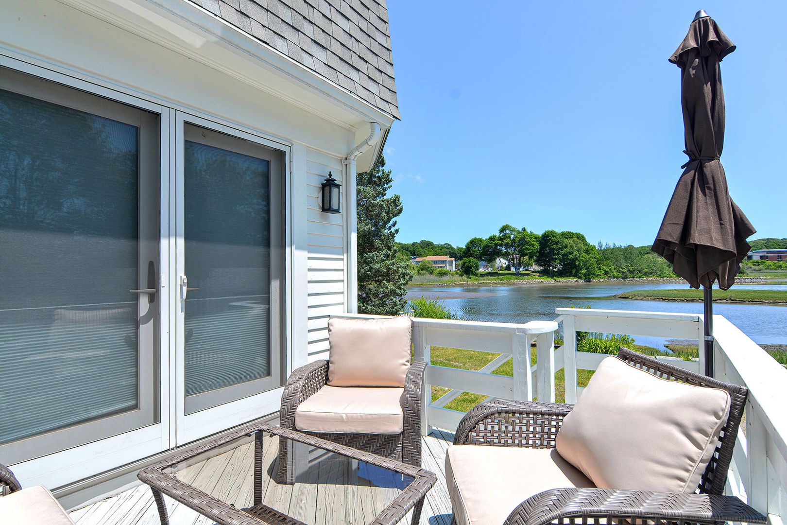 Deck over the yard, driveway and pond