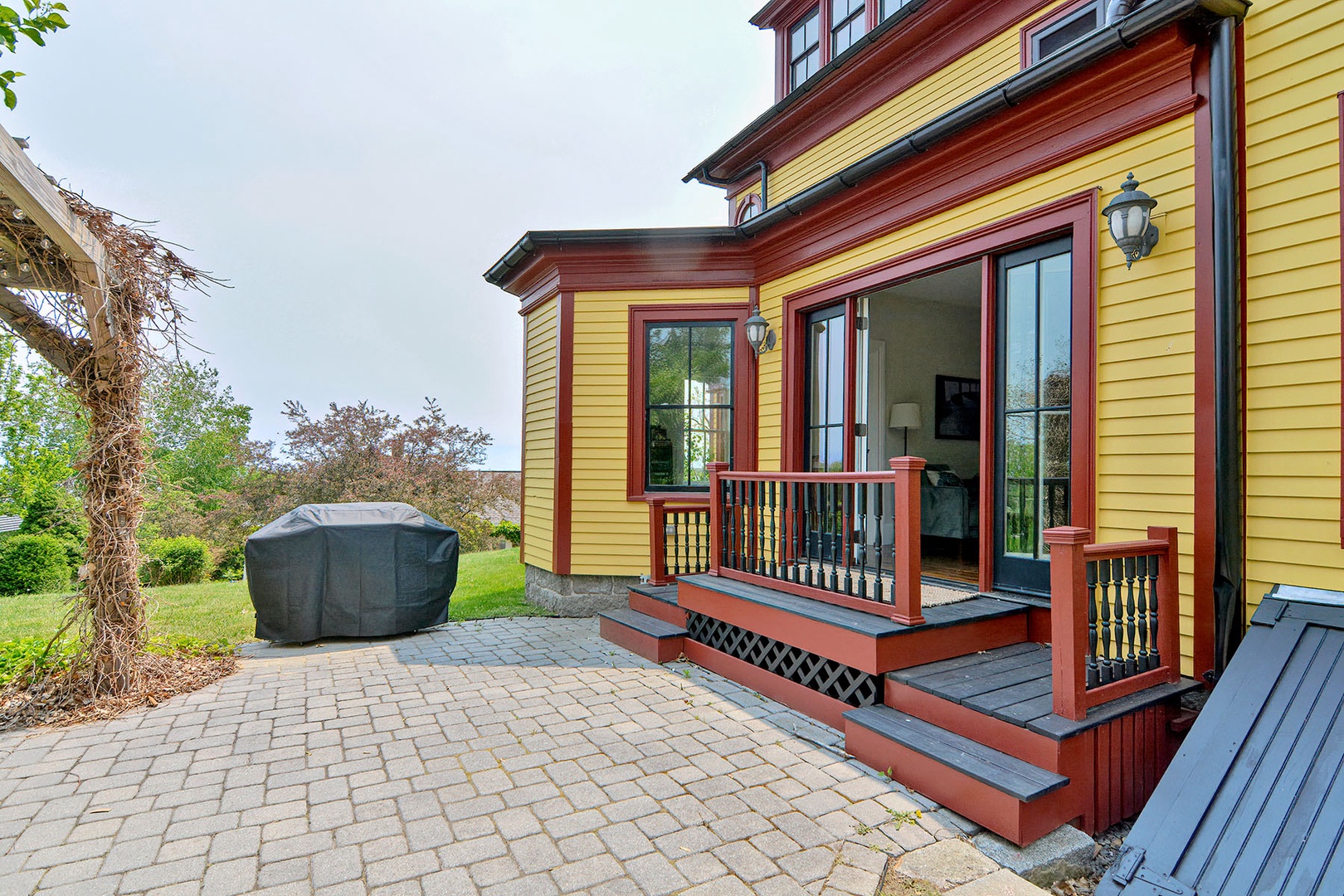 Back patio with a grill and views