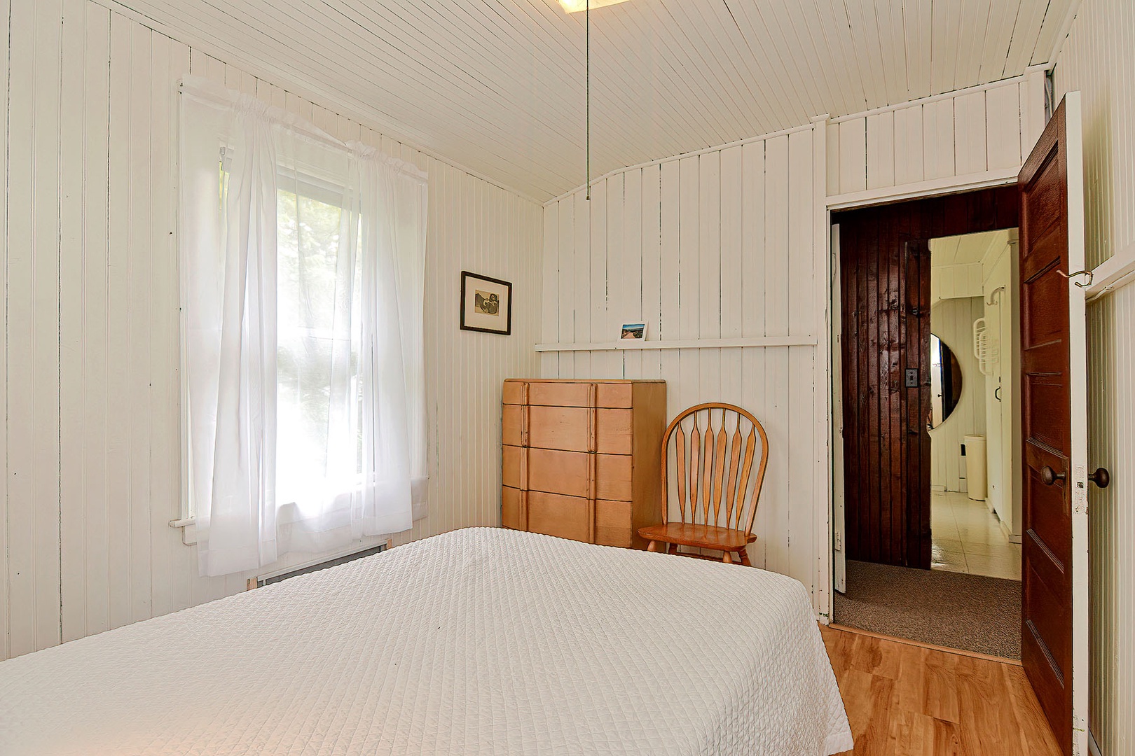 Bedroom 5 with full sized bed.