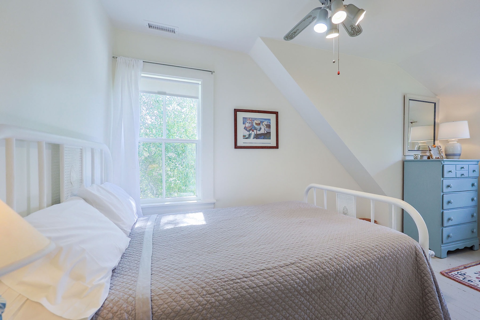 Bedroom 2 has a window with garden views.