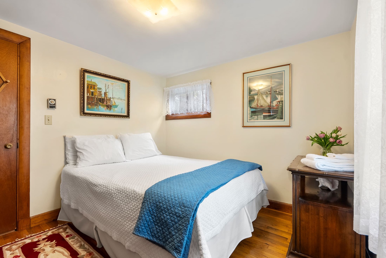 The second bedroom with a queen bed.