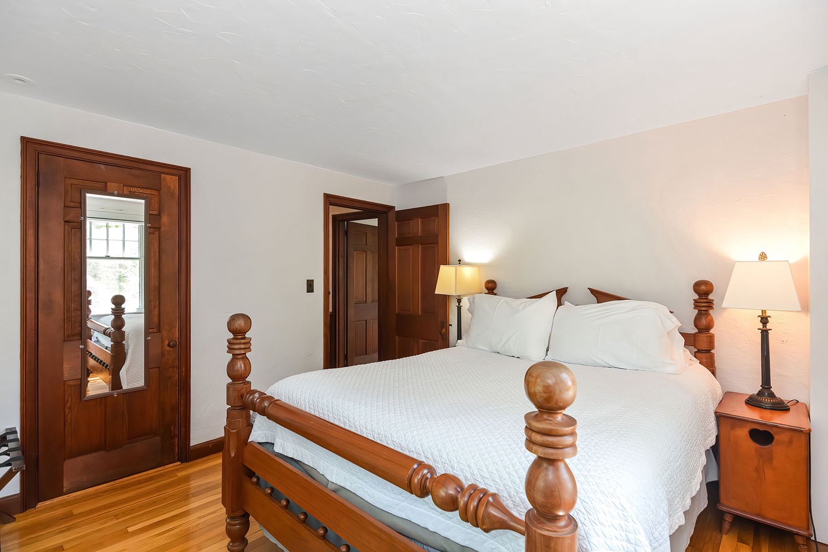 Bedroom 1: Queen bedroom with AC unit.