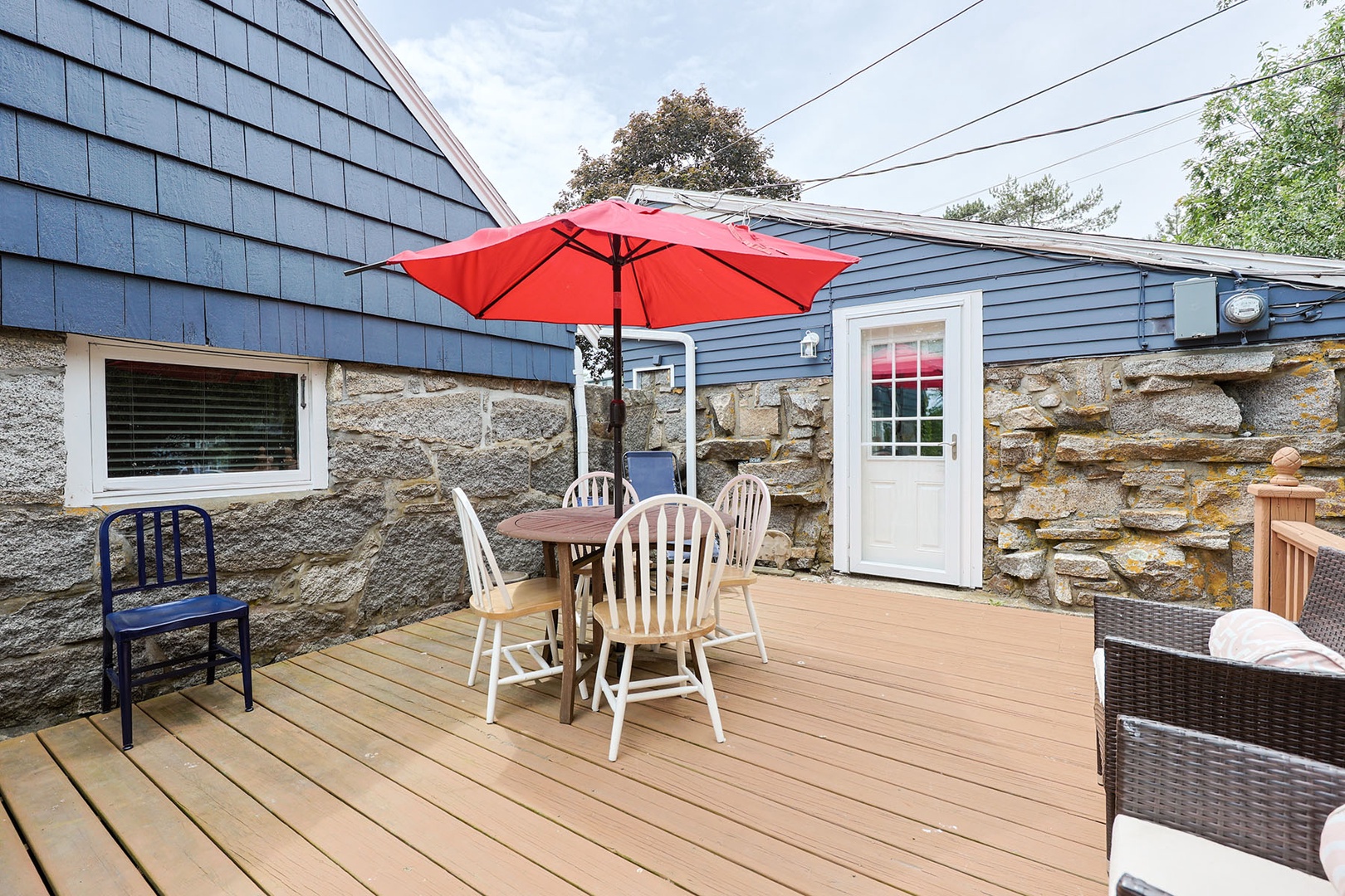 Enter the cottage from the deck on the side.