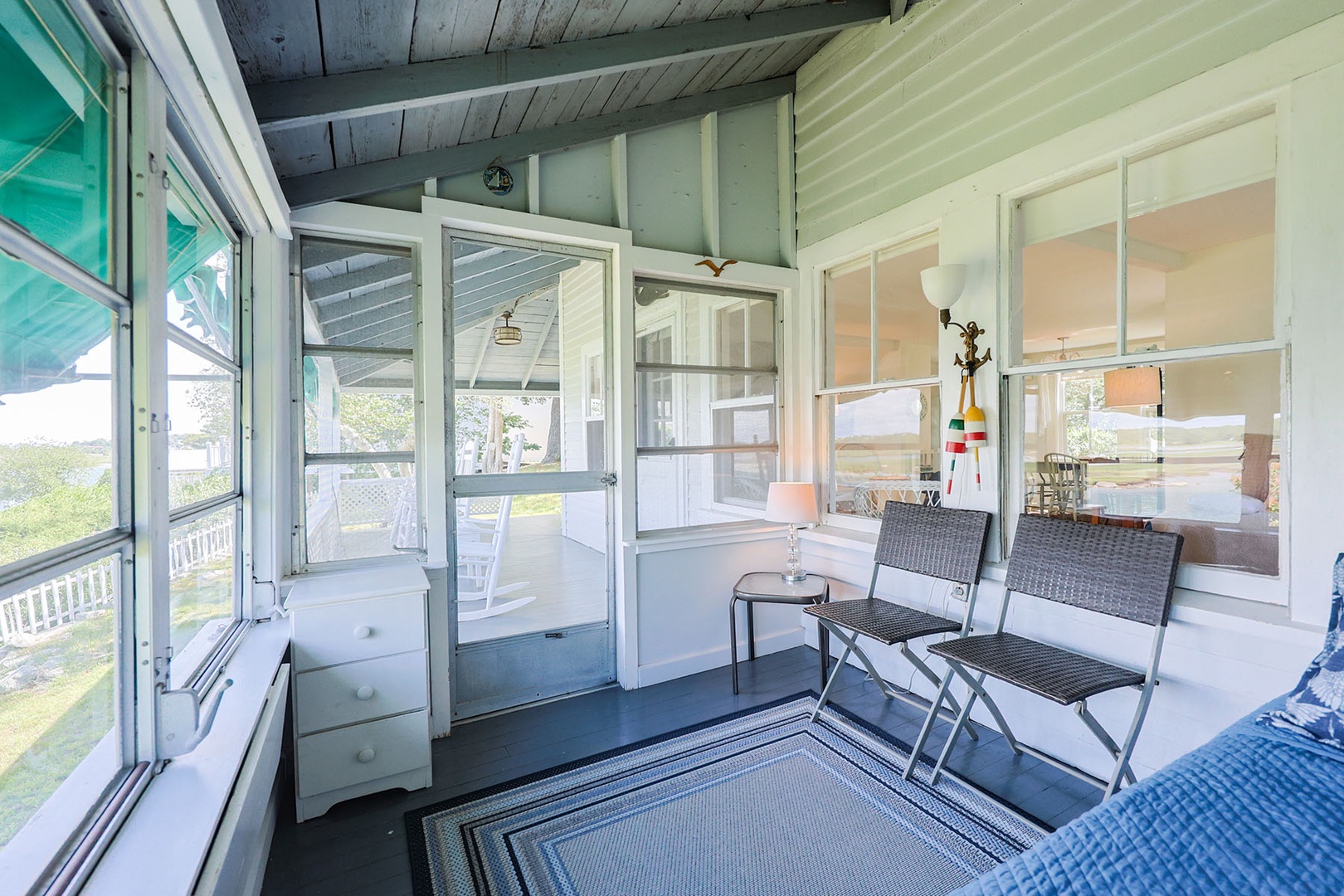 The screened-in section of the wraparound porch.