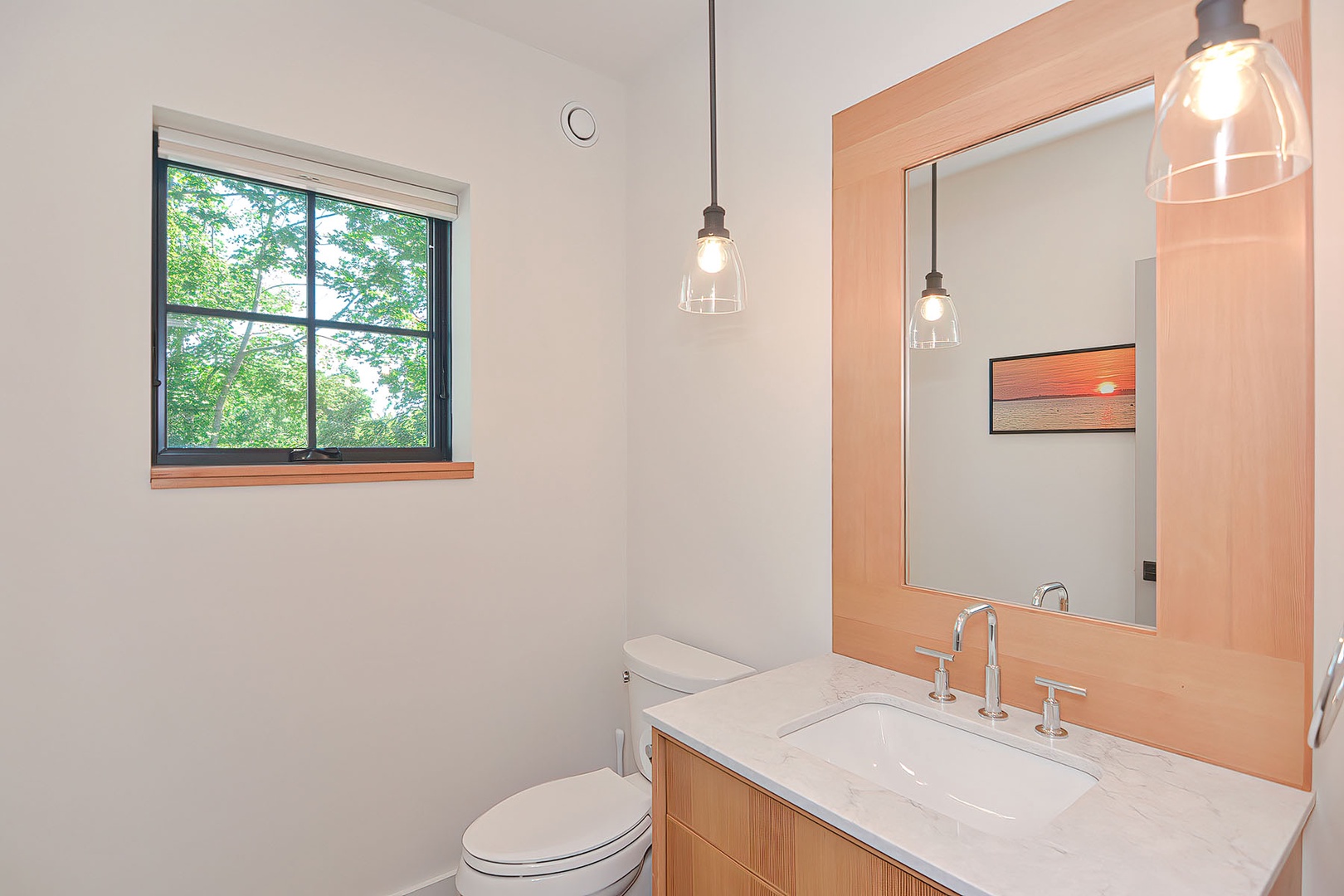 A half bath, right off the entryway, completes the main floor.
