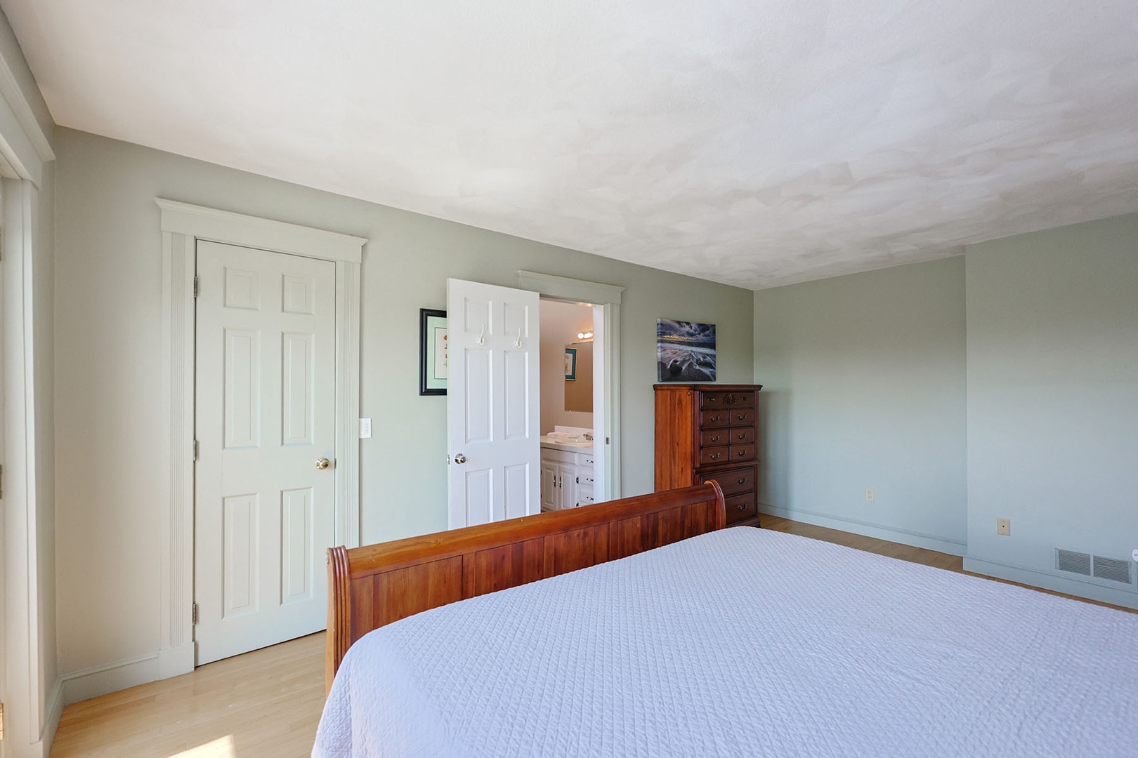 Another view of the primary bedroom.
