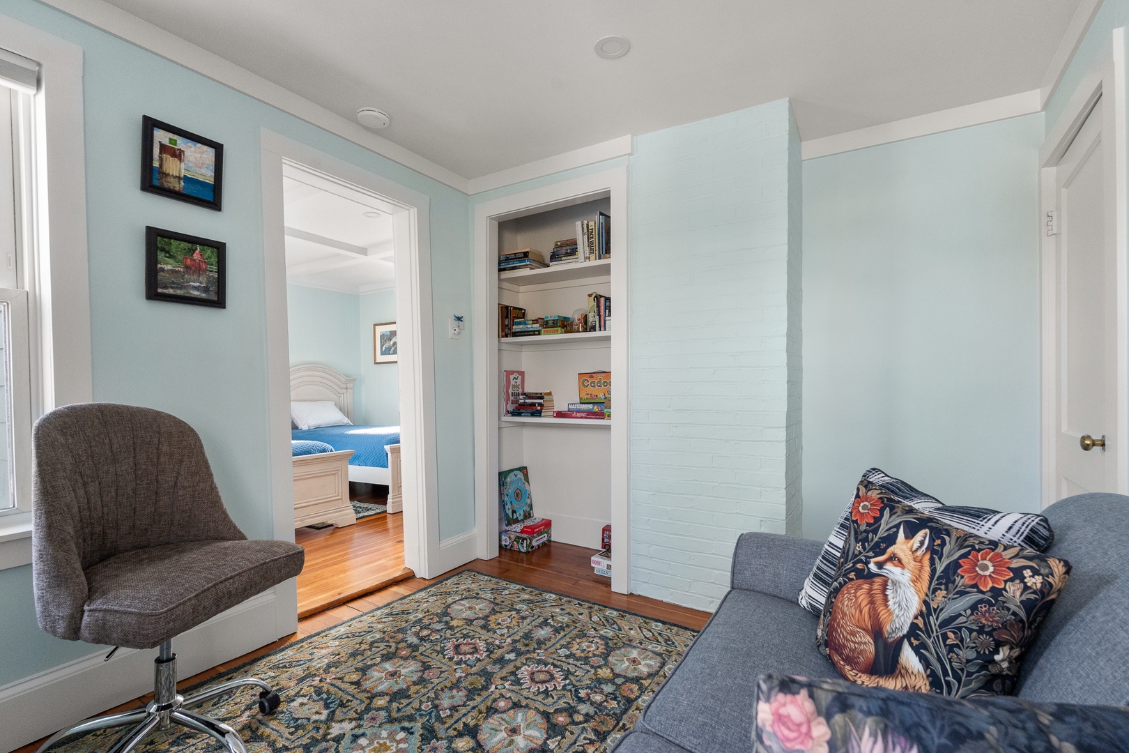 Den located in the upper floor with a pull-out sofa.
