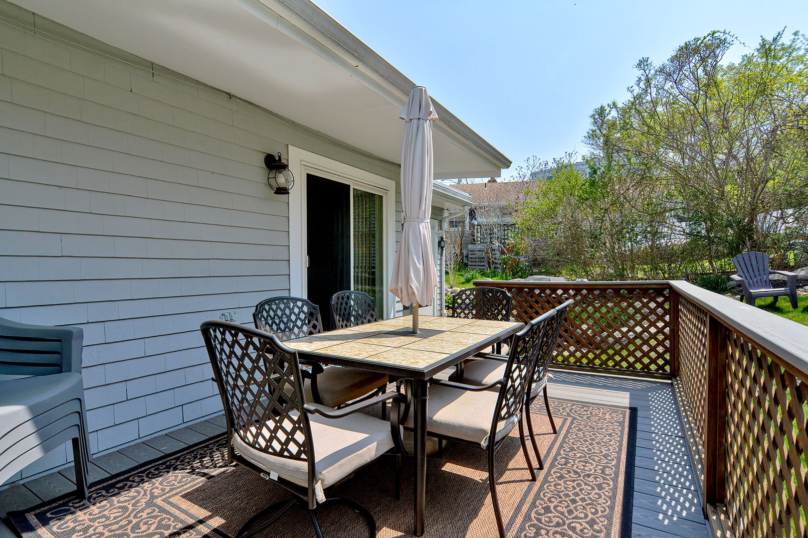 Enjoy outdoor dining surrounded by lush and vibrant greenery.