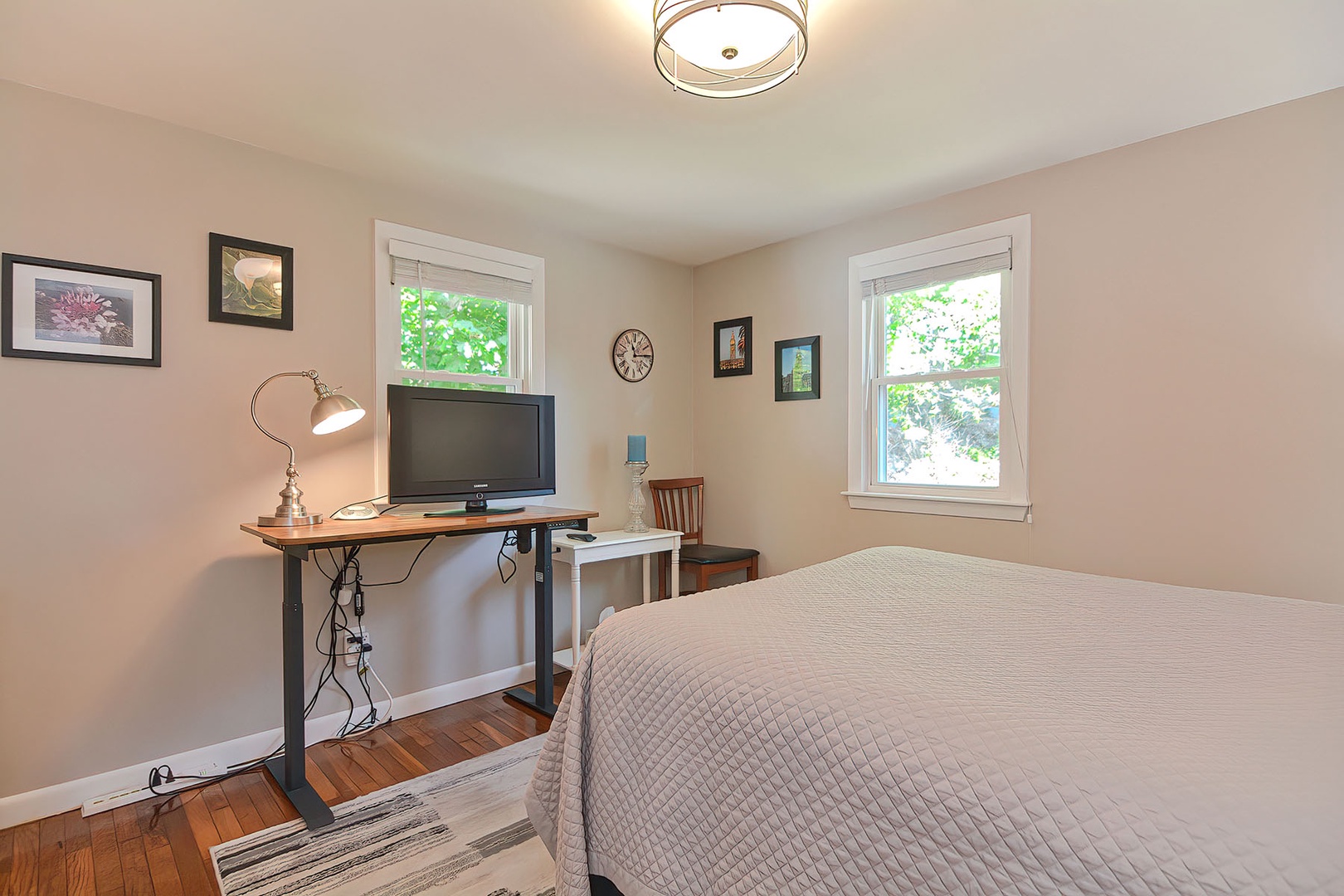 Bedroom 1 includes a flat-screen tv.